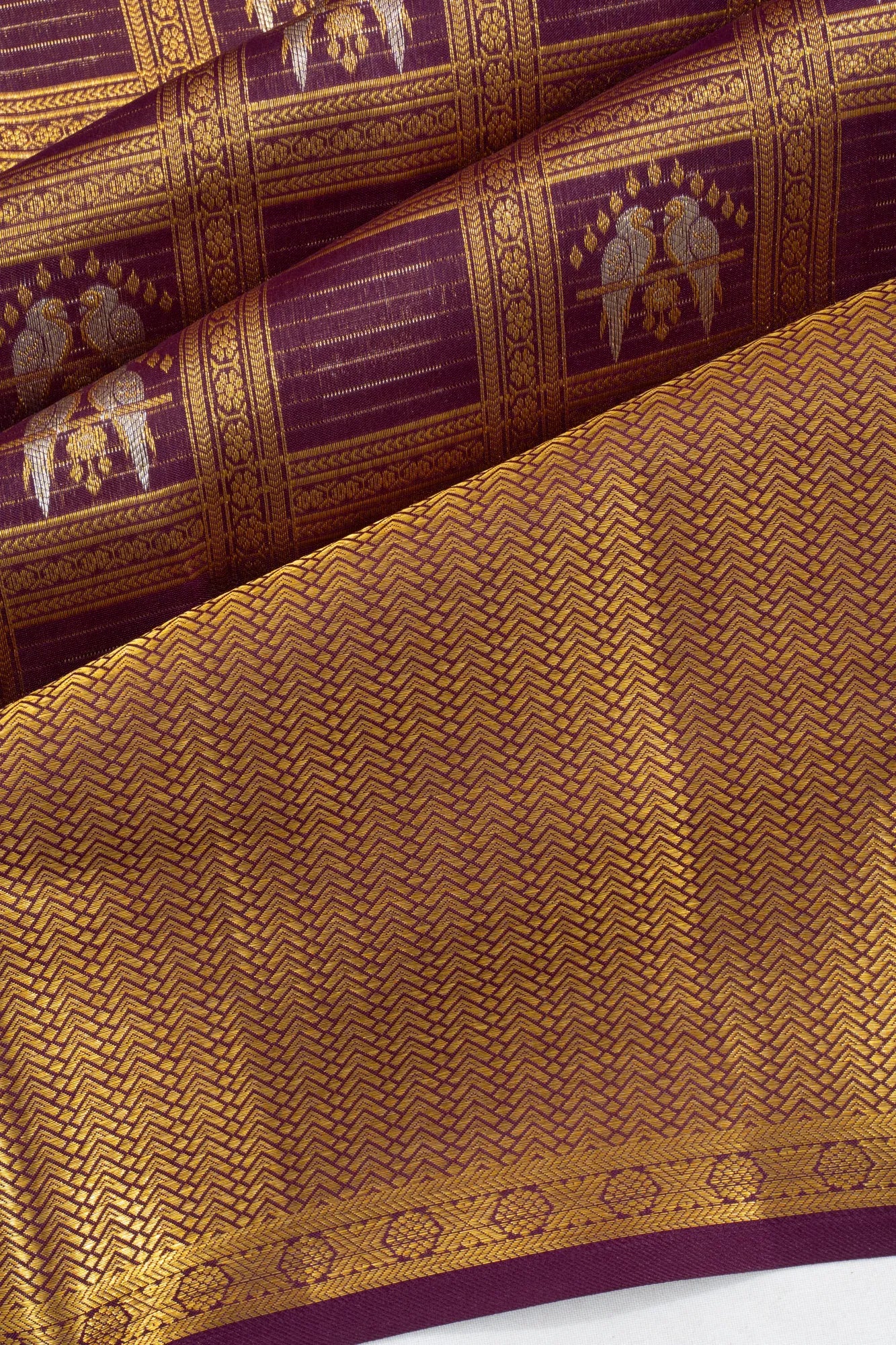 Taranga Kanchi Silk Checks And Butta Purple Saree