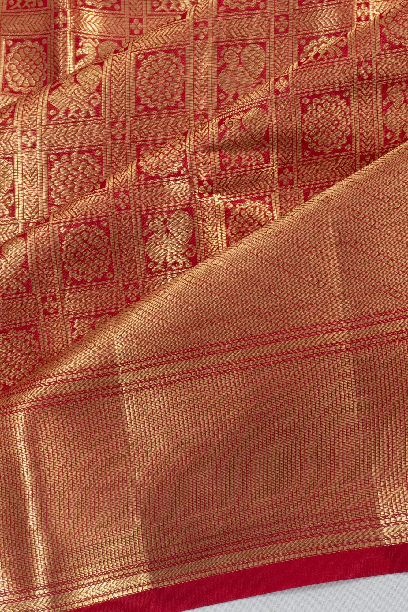 Taranga Kanchi Silk Tissue Checks And Butta Red Saree