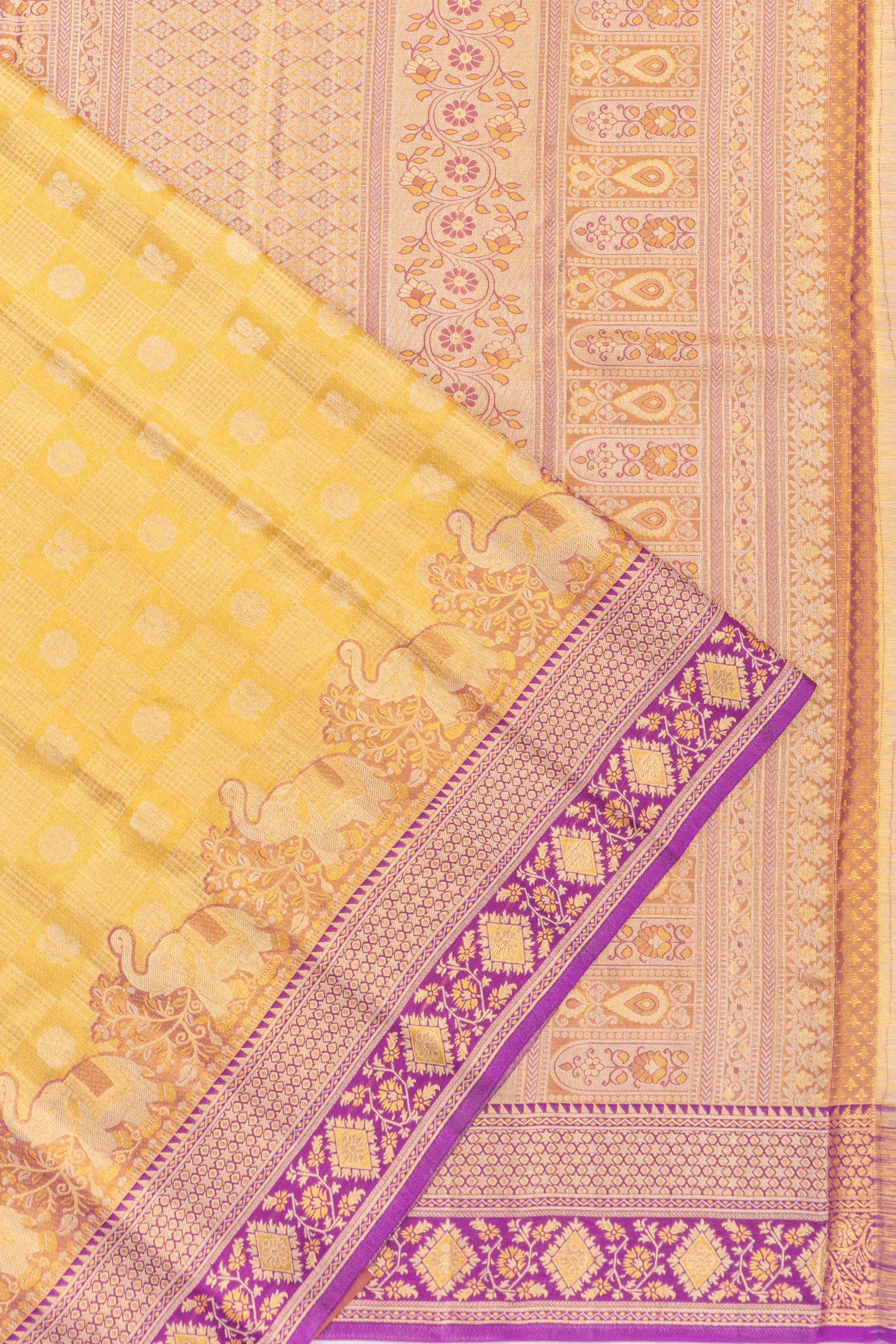 Taranga Kanchi Tissue Silk Checks And Butta Yellow Saree