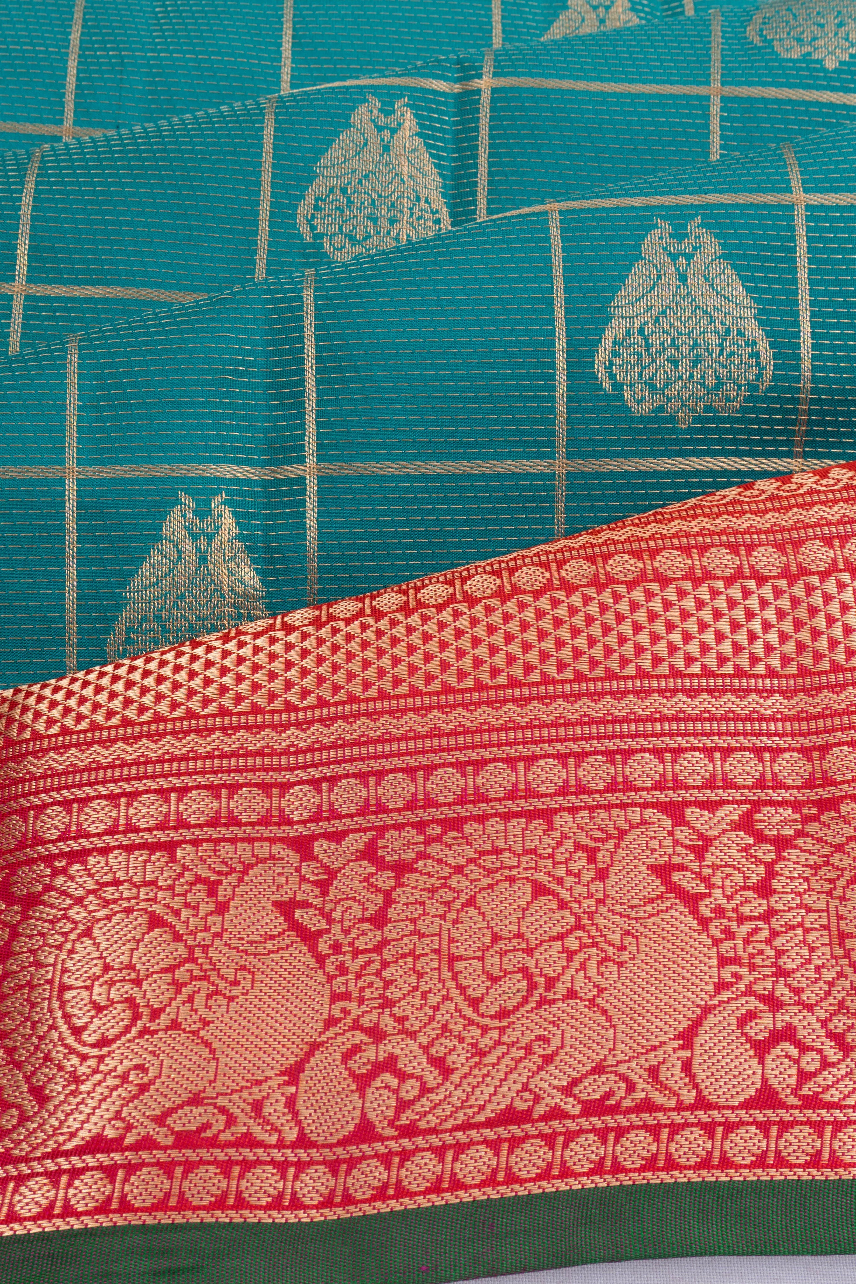 Taranga Kanchi Silk Checks And Butta Blue Saree