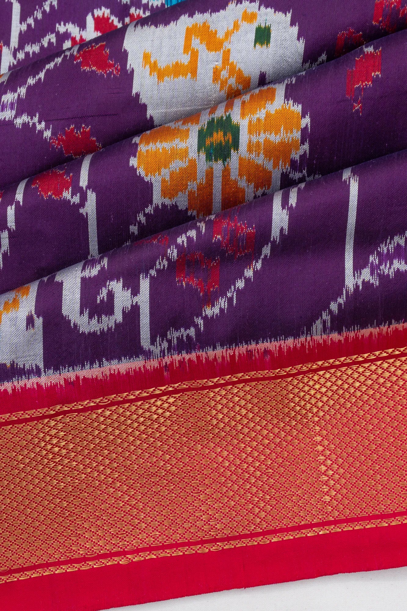 Pochampally Silk Ikat Purple Saree With Pichwai Motifs