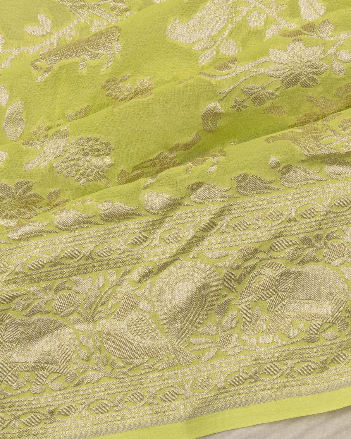 Banarasi Georgette Jaal And Pichwai Butta Green Saree