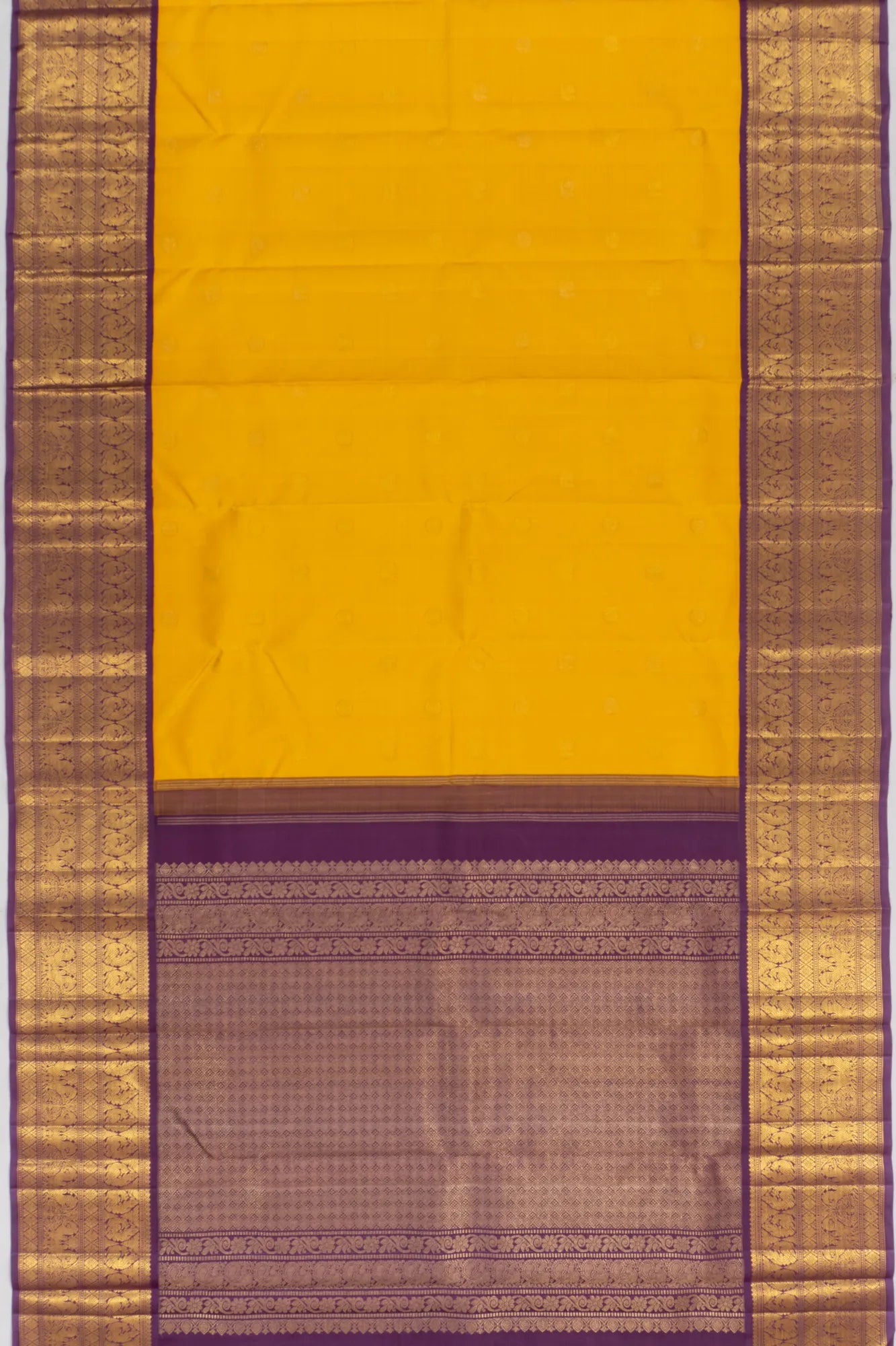 Kanchipuram Silk Checks And Butta Yellow Saree