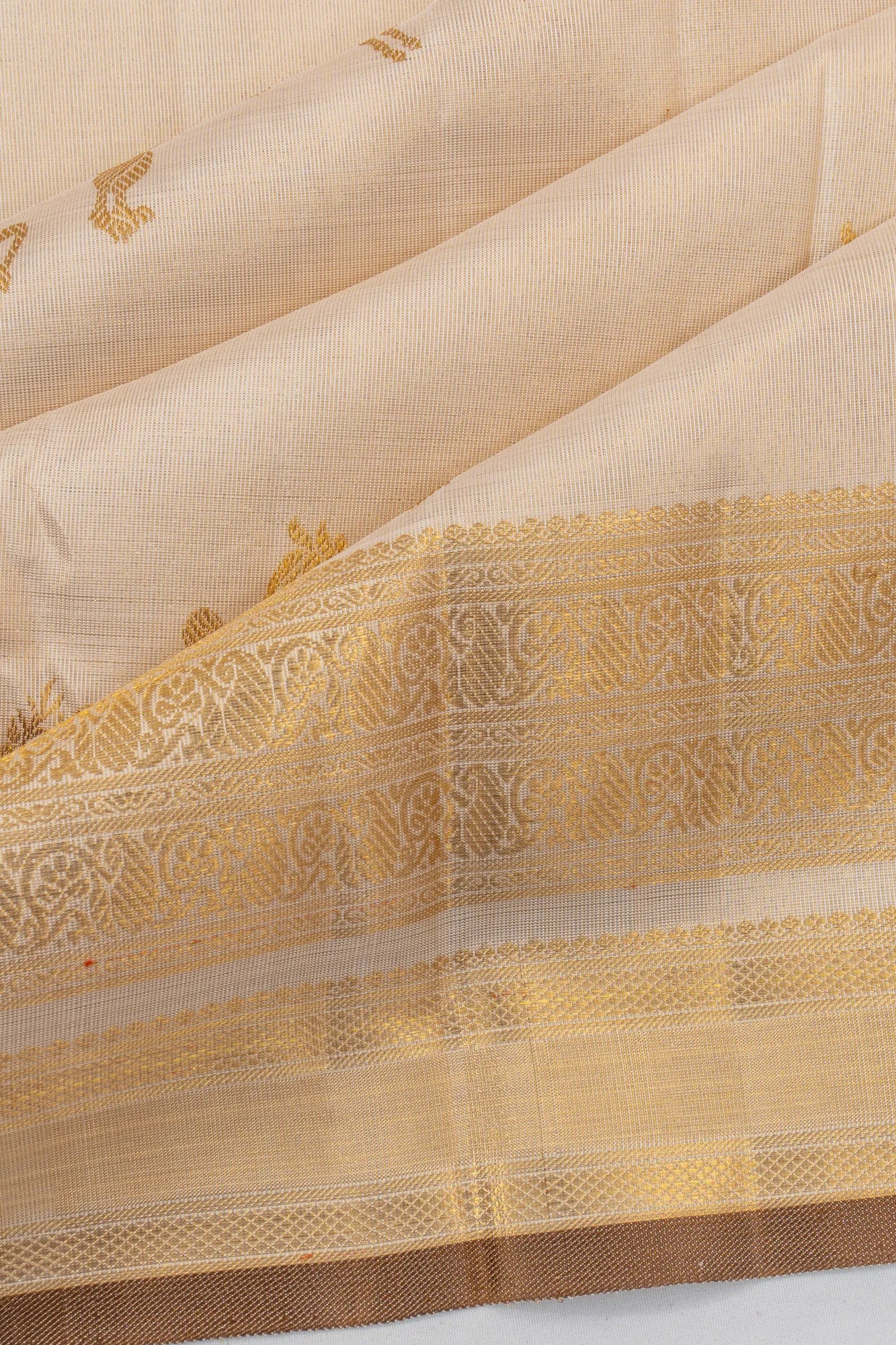 Kanchipuram Silk Lines And Brocade Cream Saree