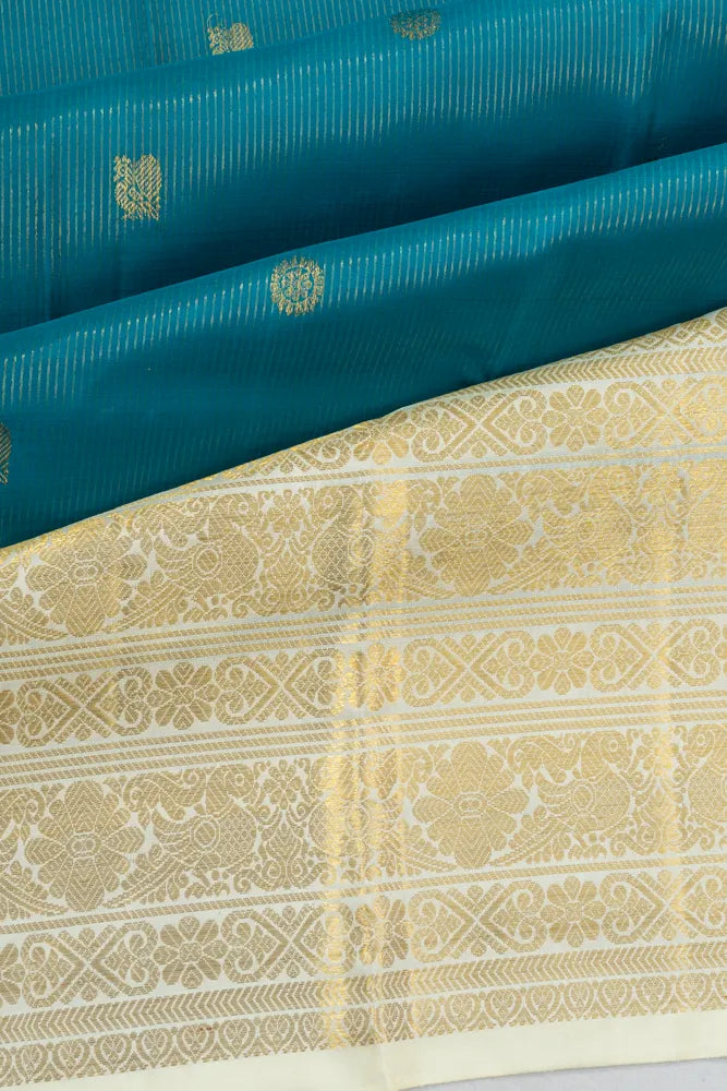 Kanchipuram Silk Oosi Lines And Butta Teal Blue Saree