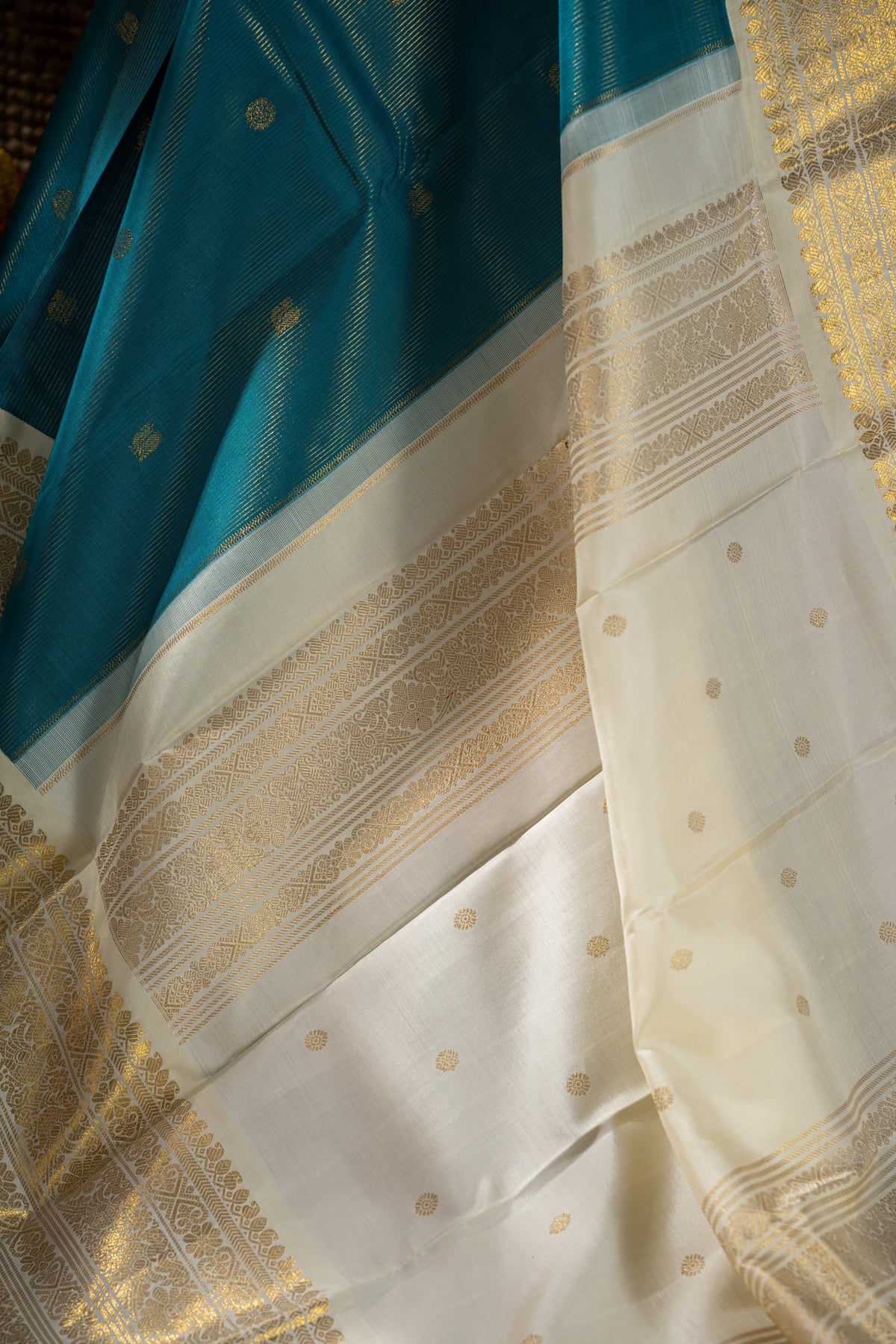 Kanchipuram Silk Oosi Lines And Butta Teal Blue Saree