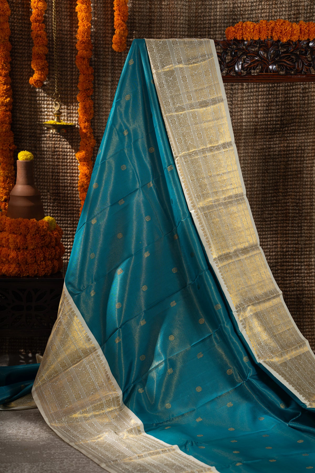 Kanchipuram Silk Oosi Lines And Butta Teal Blue Saree