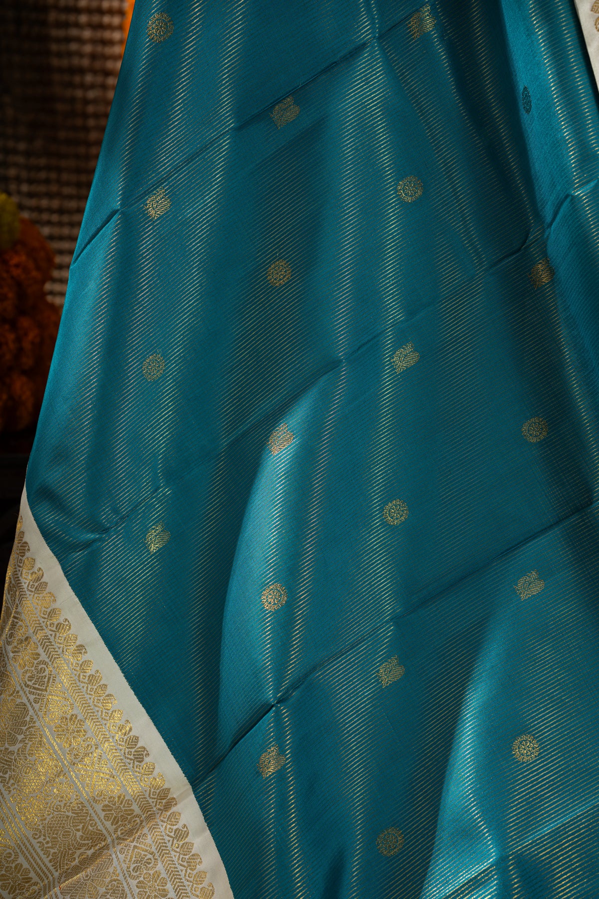 Kanchipuram Silk Oosi Lines And Butta Teal Blue Saree