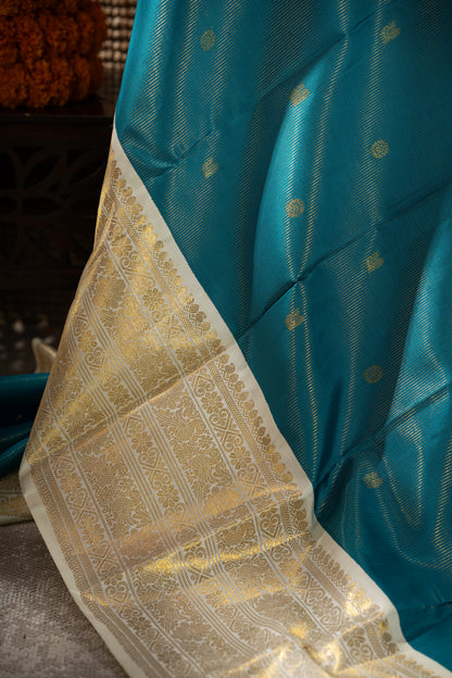 Kanchipuram Silk Oosi Lines And Butta Teal Blue Saree