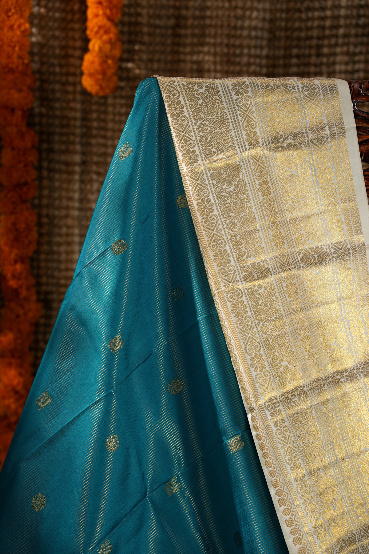 Kanchipuram Silk Oosi Lines And Butta Teal Blue Saree