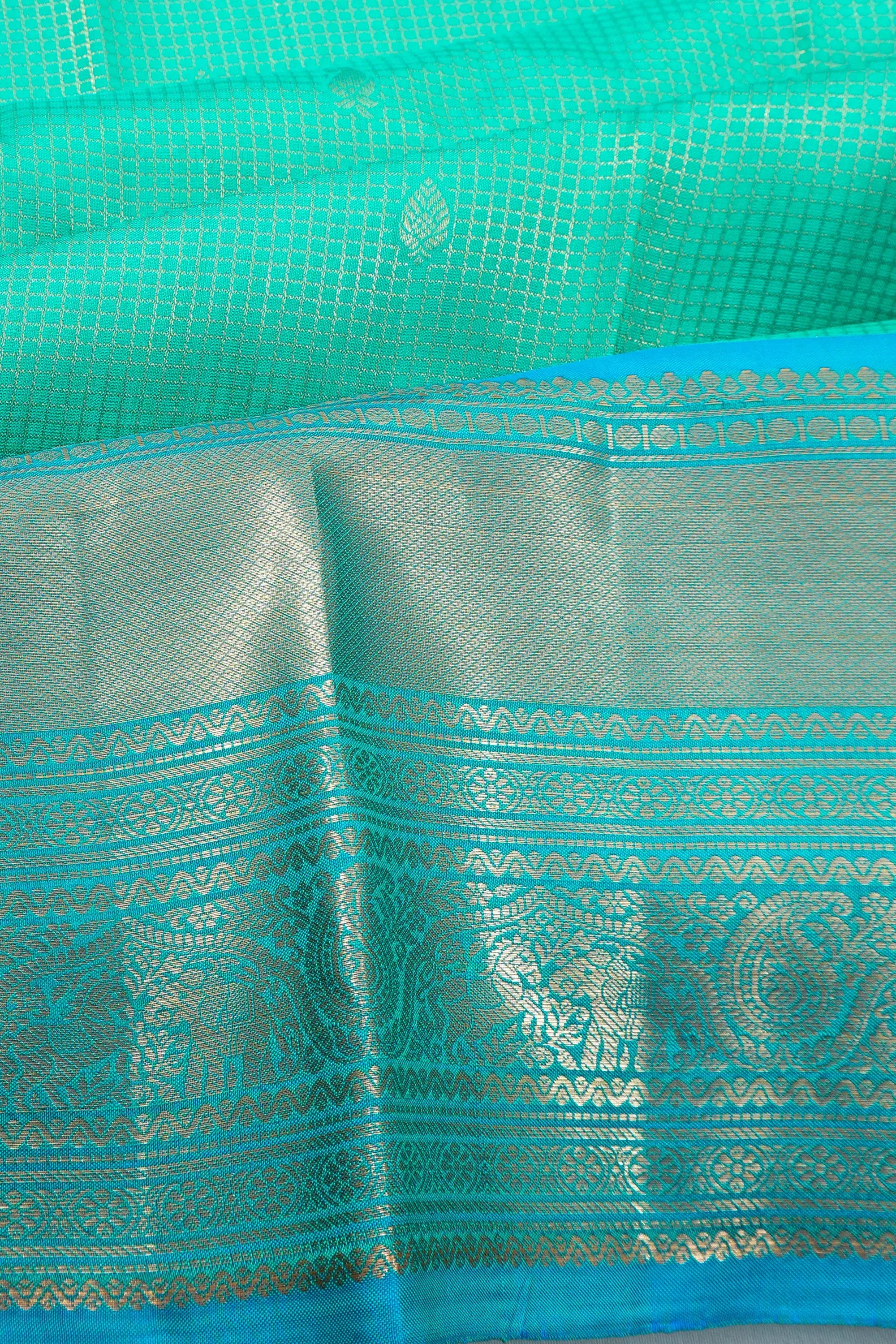 Soft Silk Checks And Butta Sea Green Saree