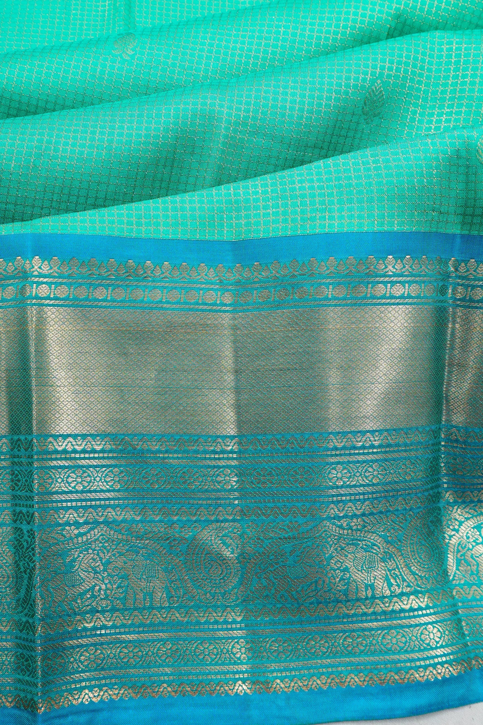 Soft Silk Checks And Butta Sea Green Saree