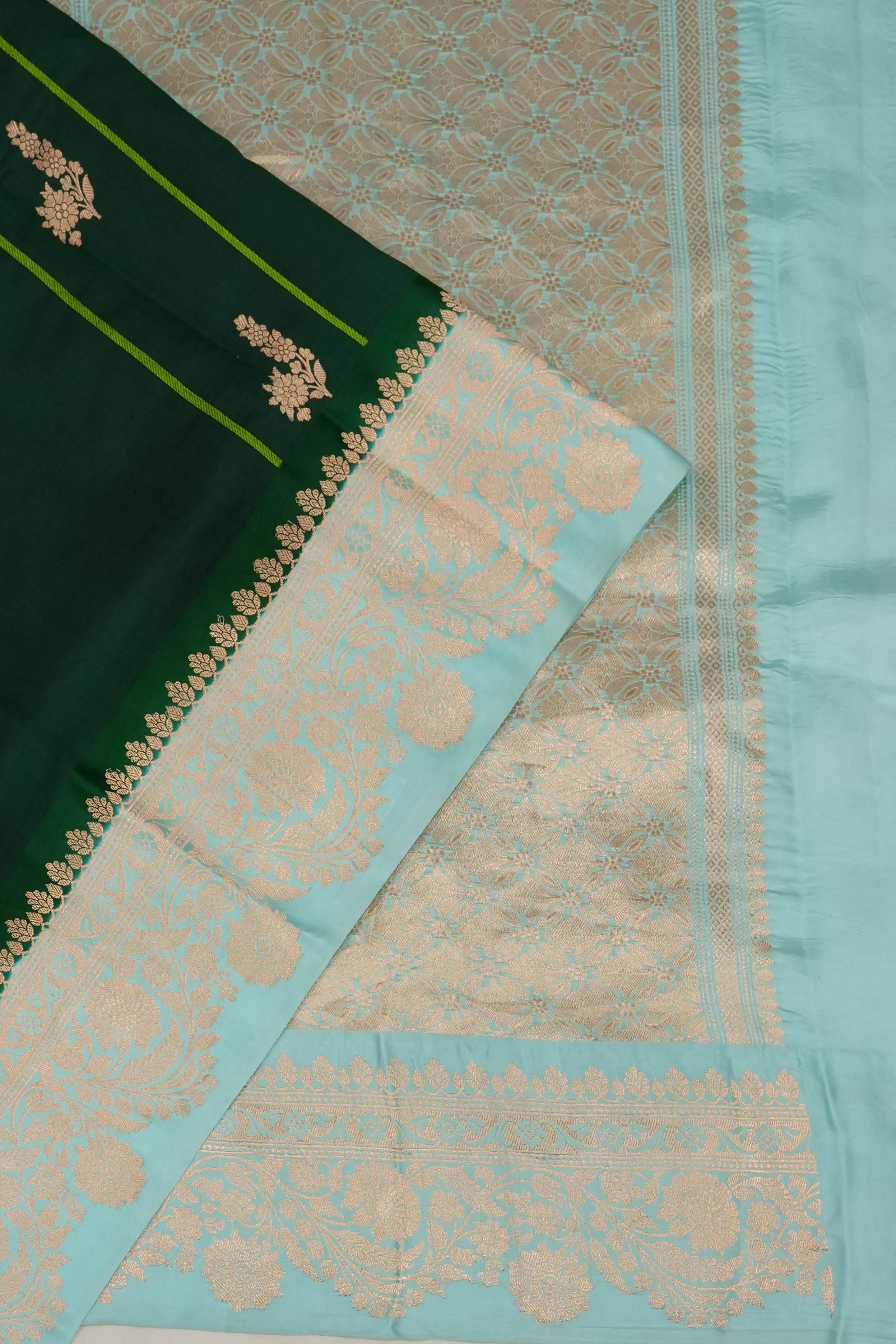 Vaanya Banaras Silk Lines And Butta Dark Green Saree