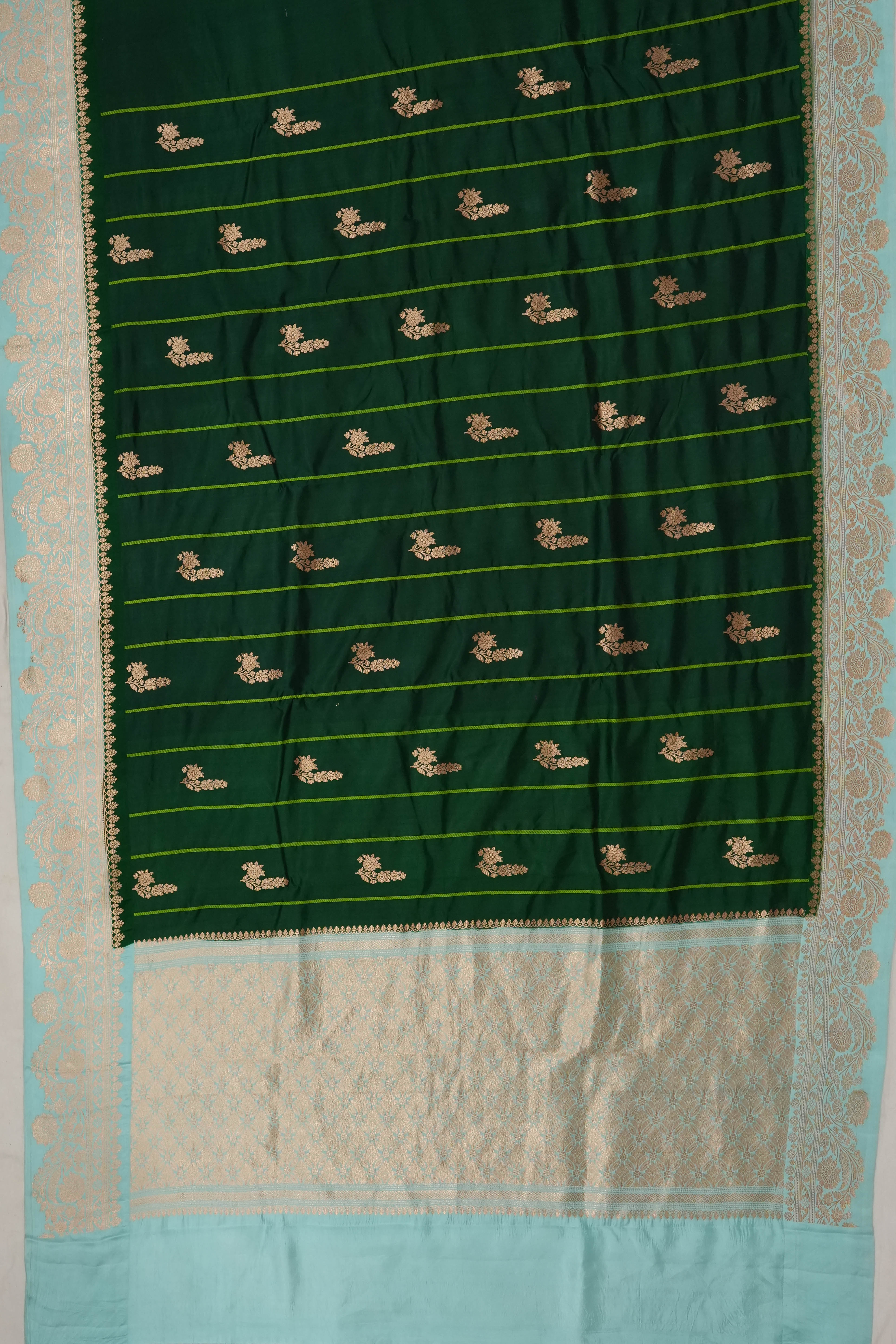Vaanya Banaras Silk Lines And Butta Dark Green Saree