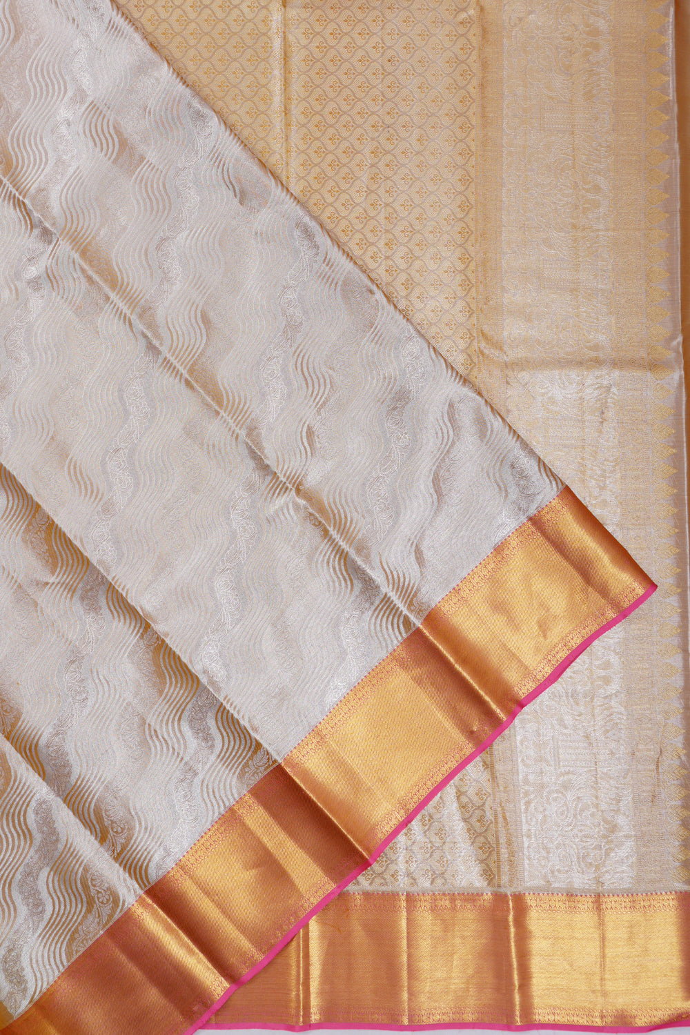 Taranga Kanchi Silk Jaal Peach Saree