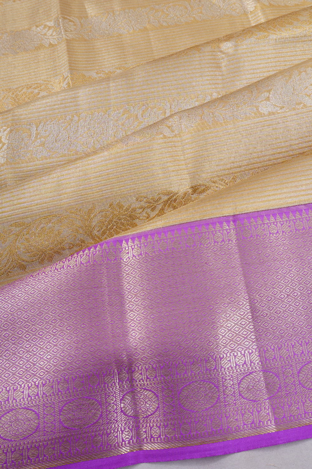 Taranga Kanchi Silk Tissue Brocade Gold Saree