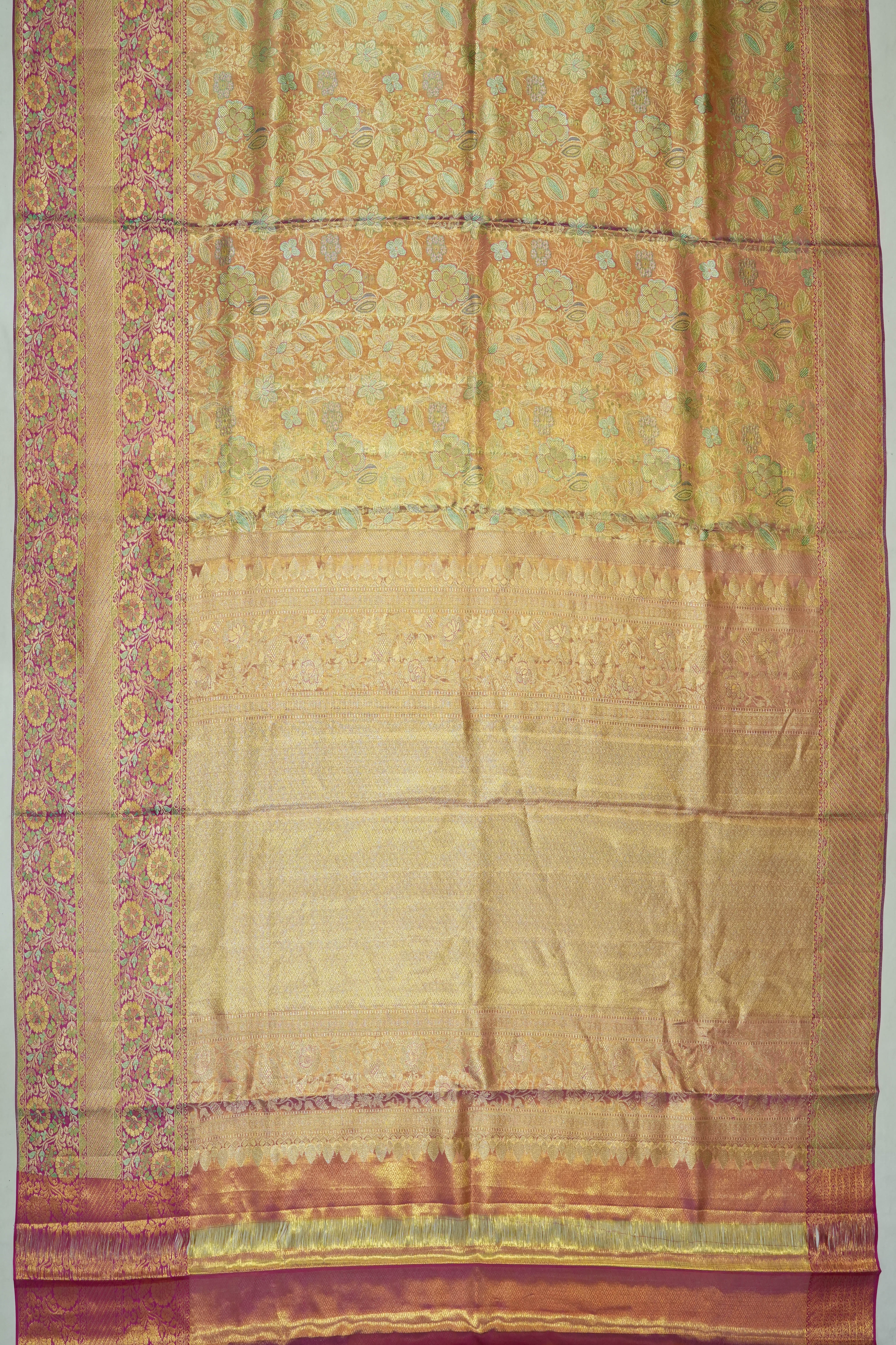 Taranga Kanchi Silk Tissue Brocade Gold Saree