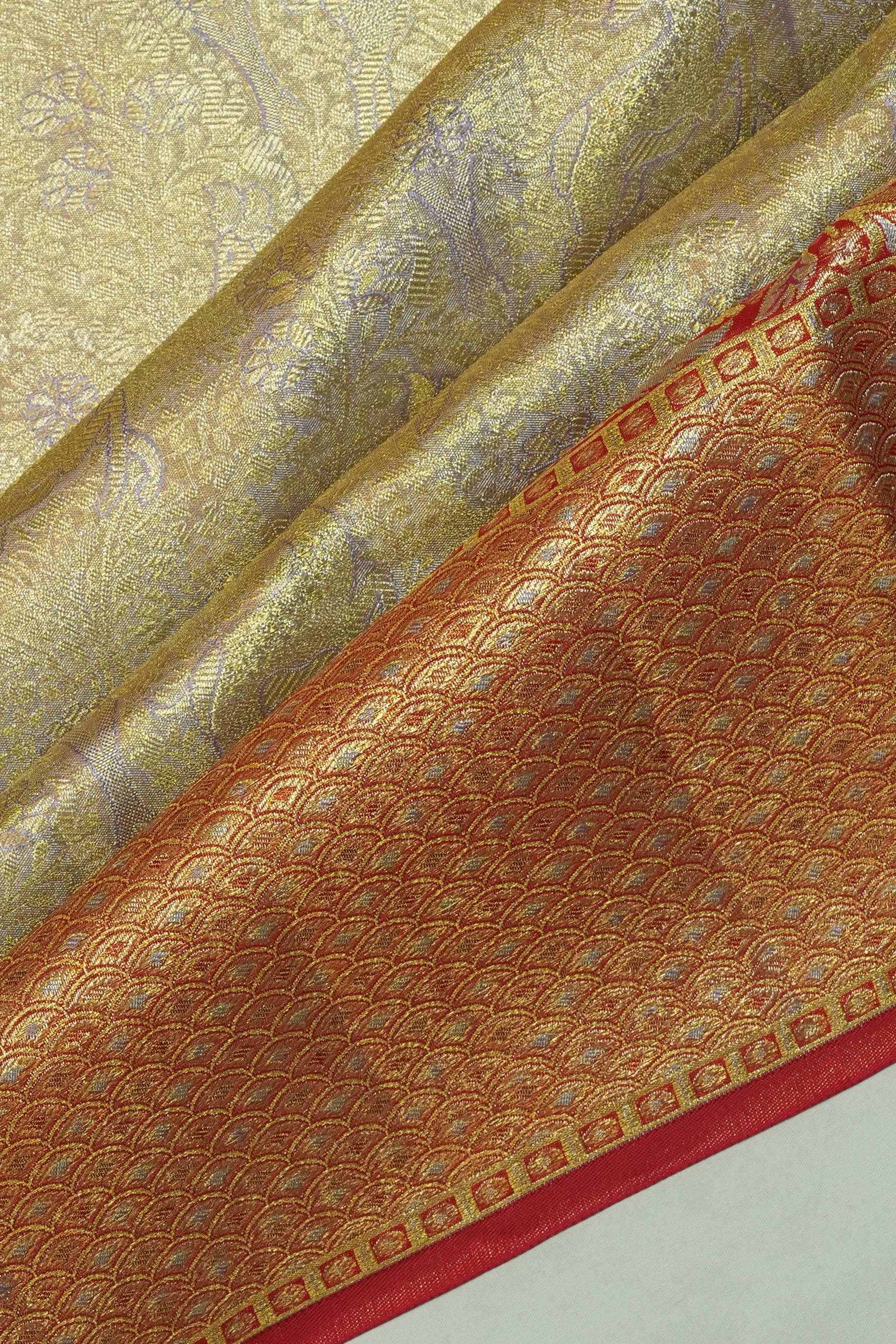 Taranga Kanchi Silk Tissue Brocade Grey Saree