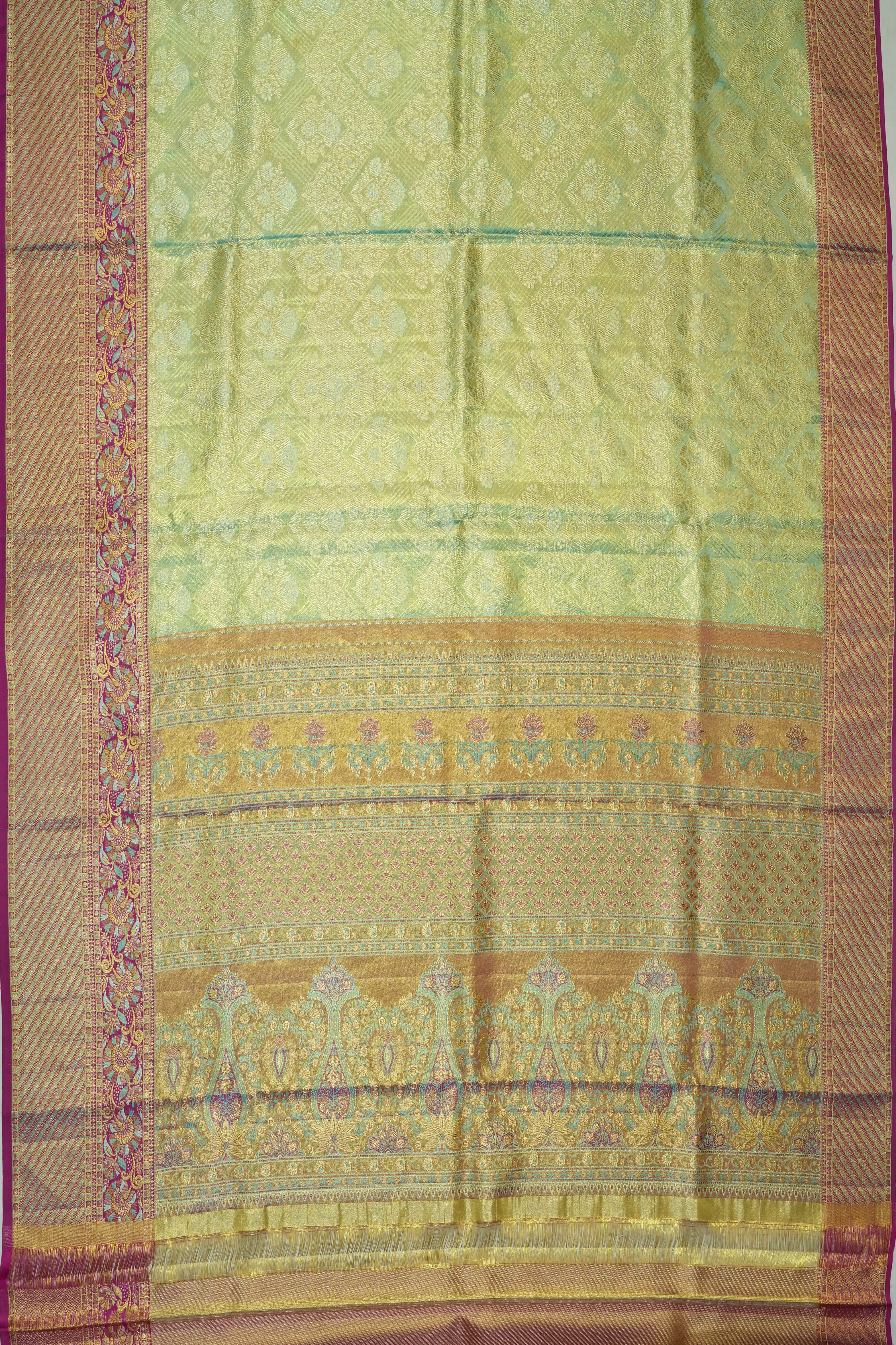 Taranga Kanchi Silk Tissue Brocade Green Saree