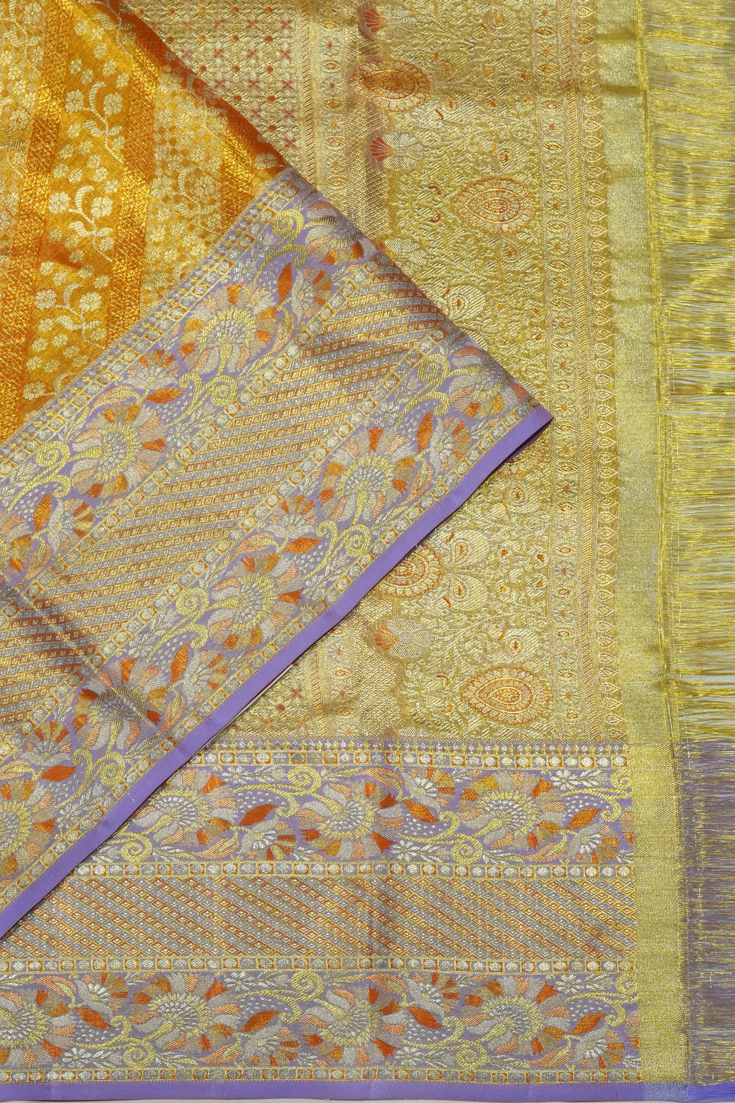 Taranga Kanchi Silk Tissue Brocade Gold Saree