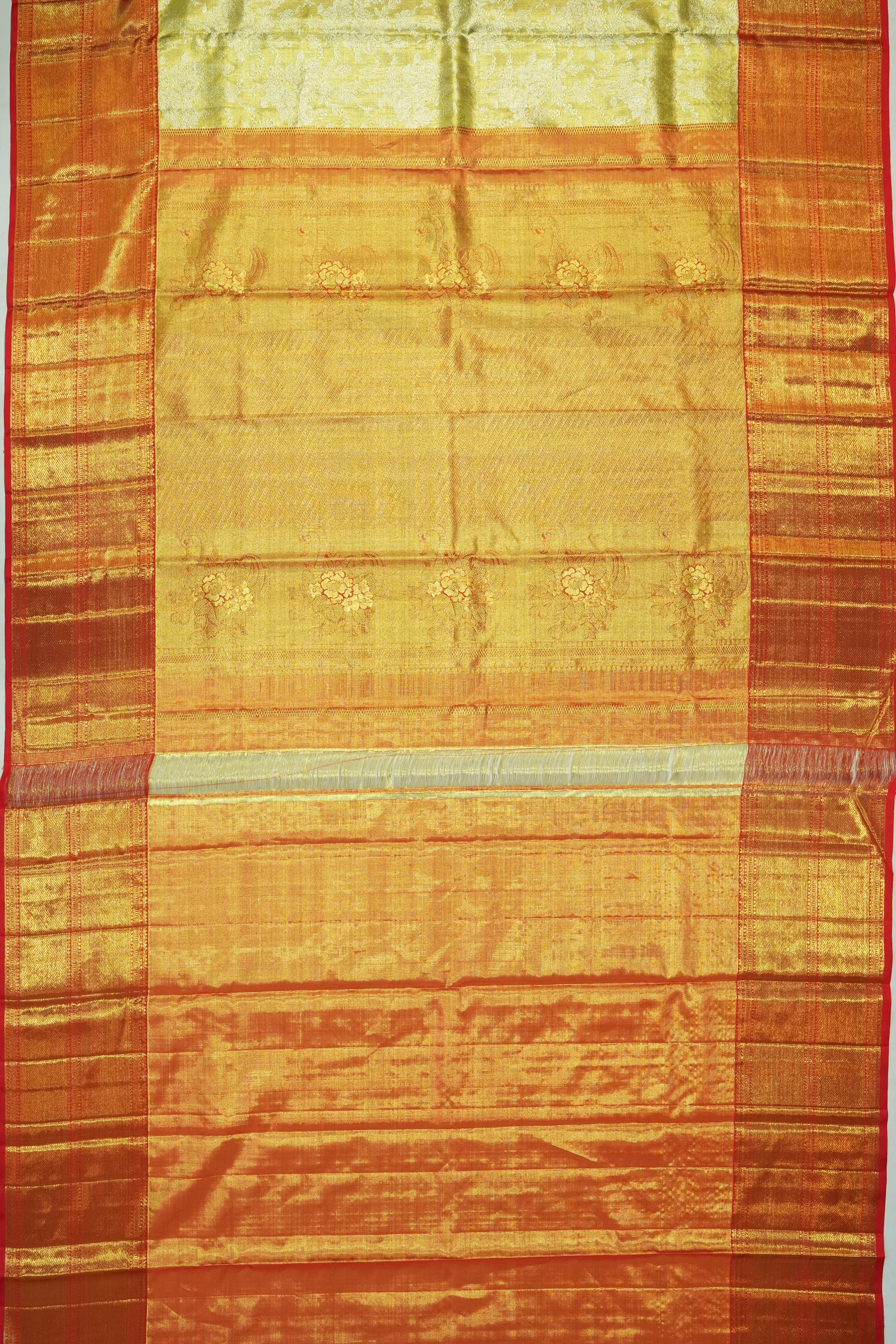 Taranga Kanchi Silk Tissue Brocade Gold Saree