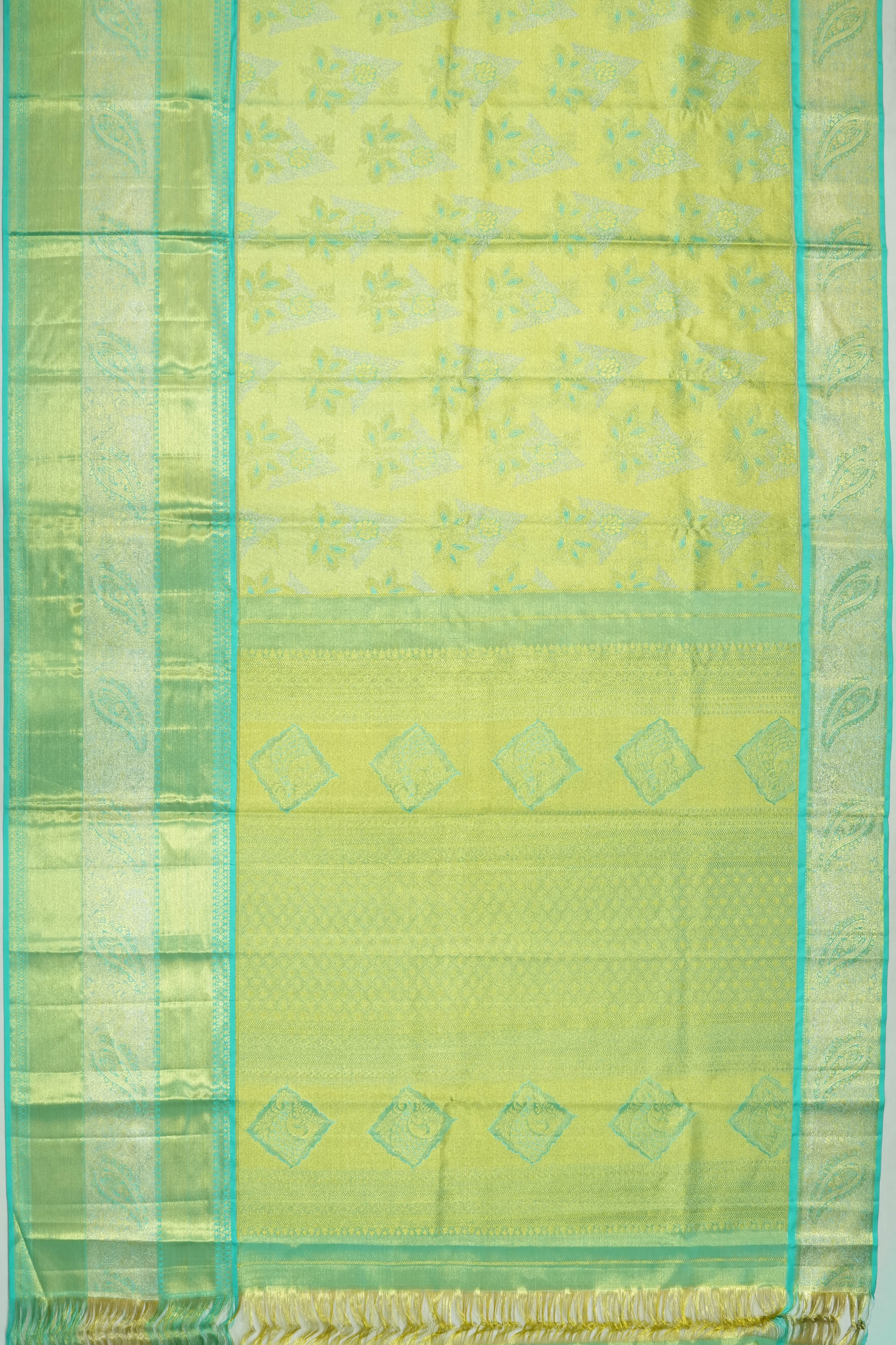 Taranga Kanchi Silk Tissue Brocade Green Saree