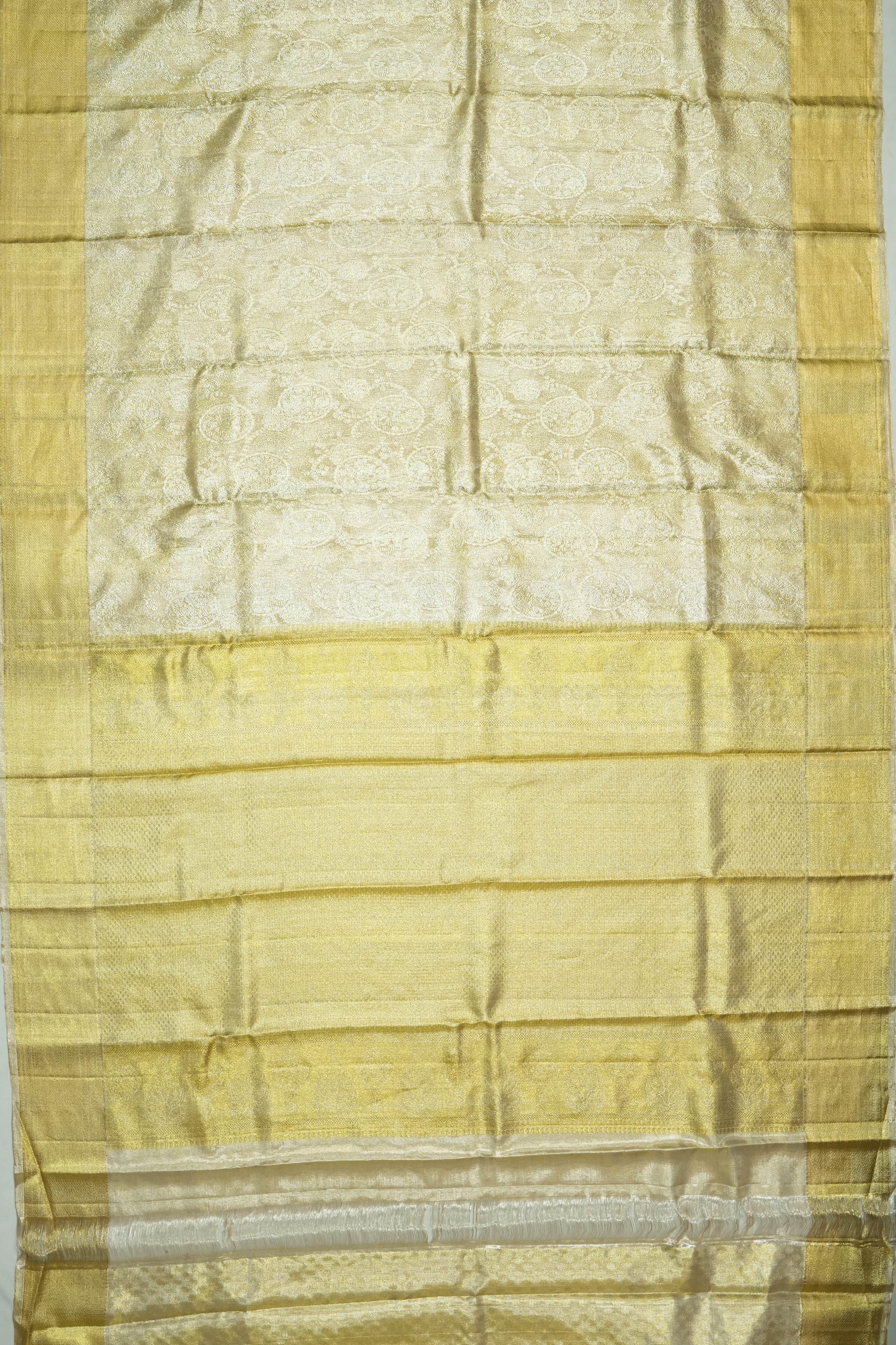 Taranga Kanchi Silk Tissue Brocade Gold Saree