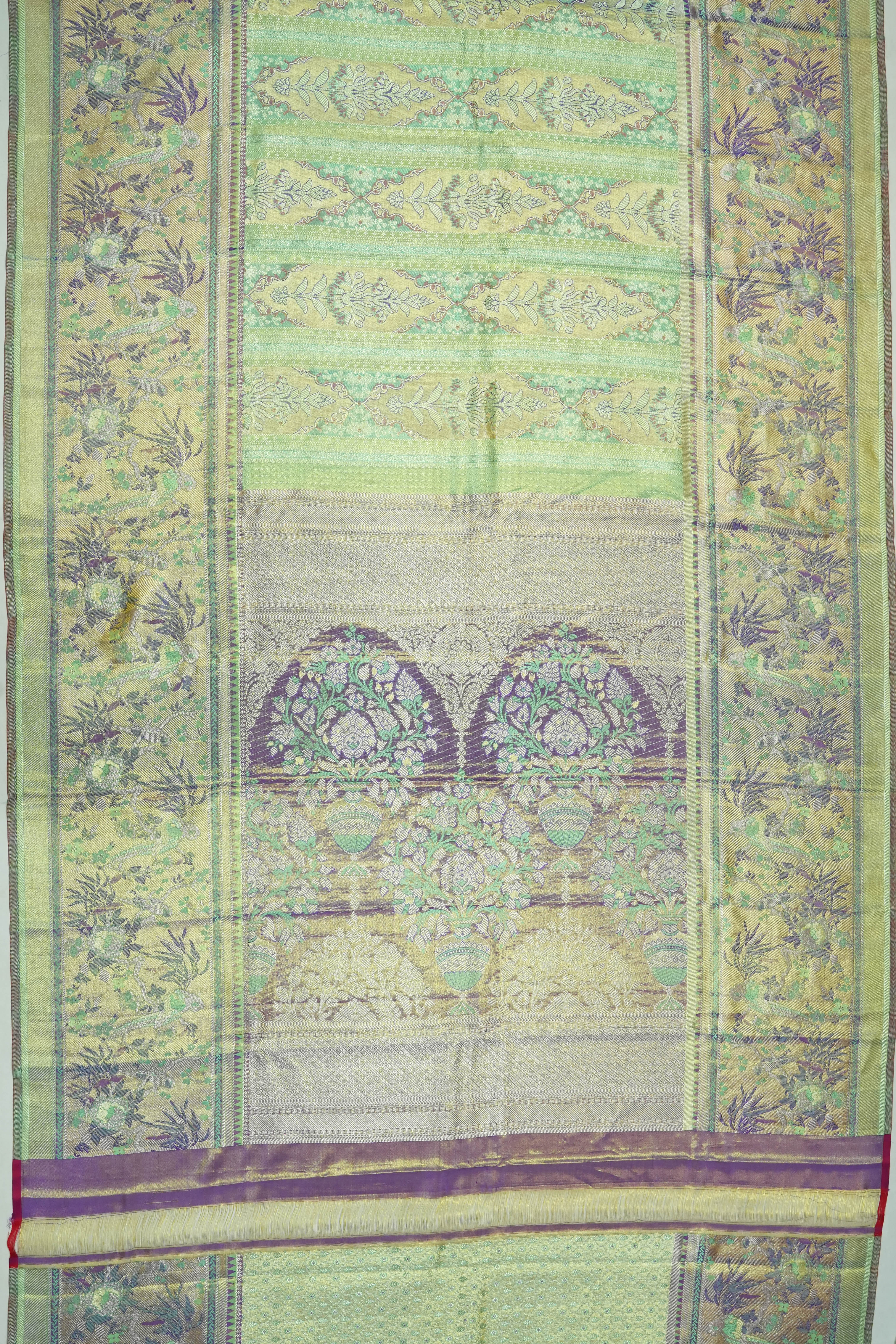 Taranga Kanchi Silk Tissue Brocade Green Saree