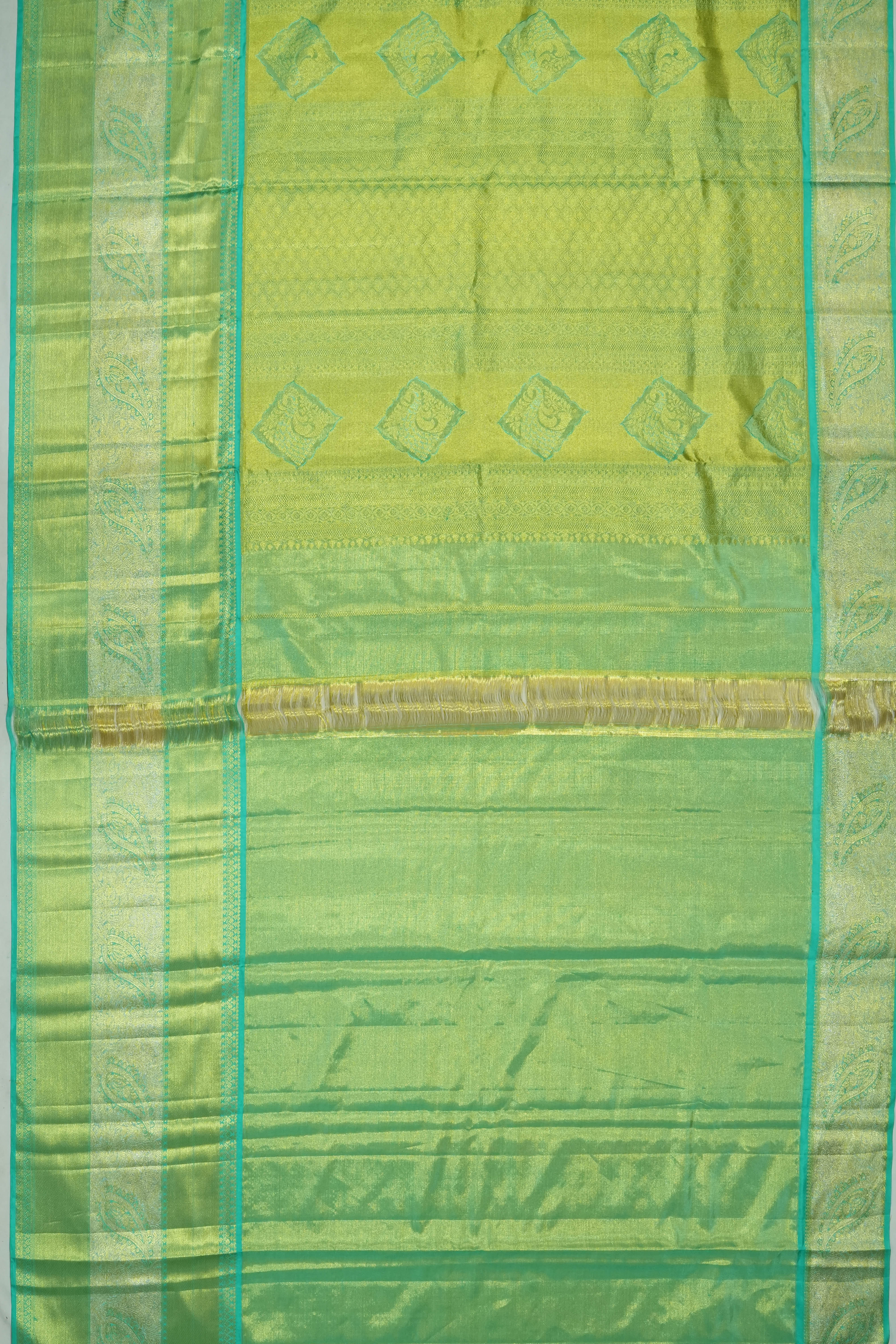 Taranga Kanchi Silk Tissue Brocade Green Saree