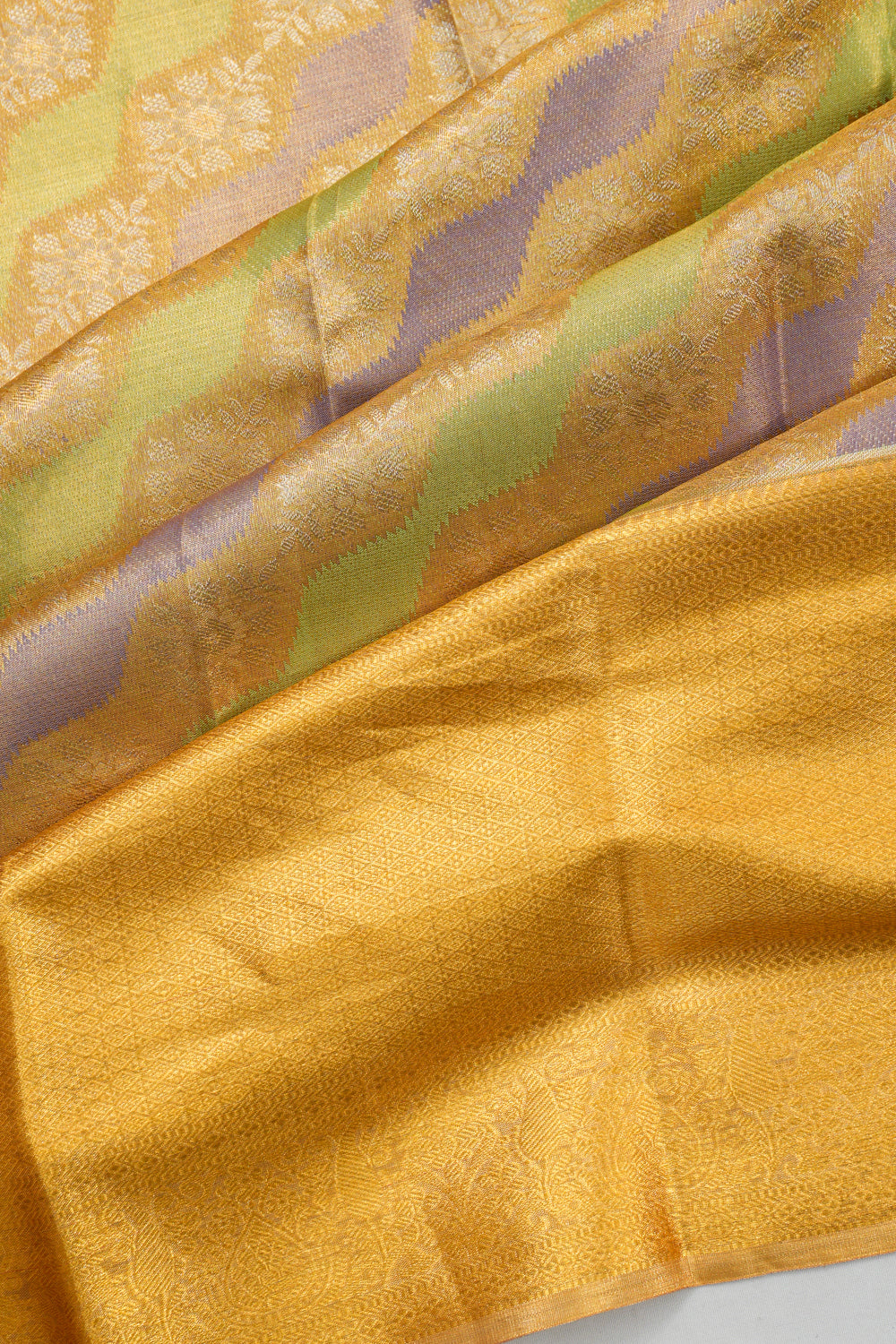 Taranga Kanchi Silk Tissue Brocade Gold Saree