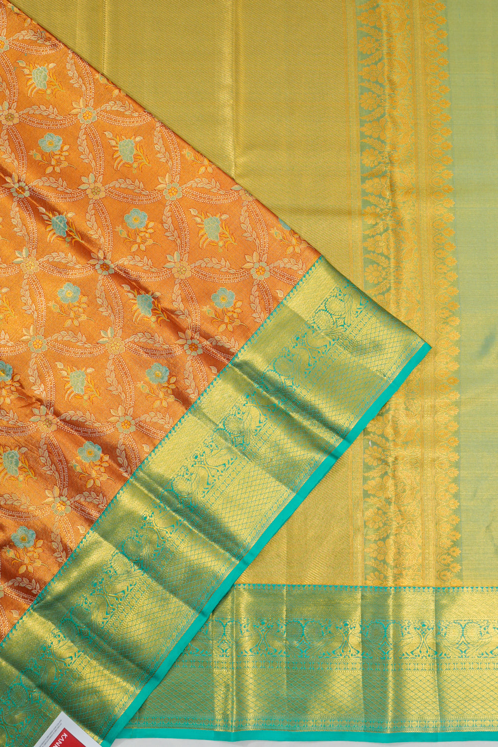 Taranga Kanchi Silk Jaal And Butta Orange Saree