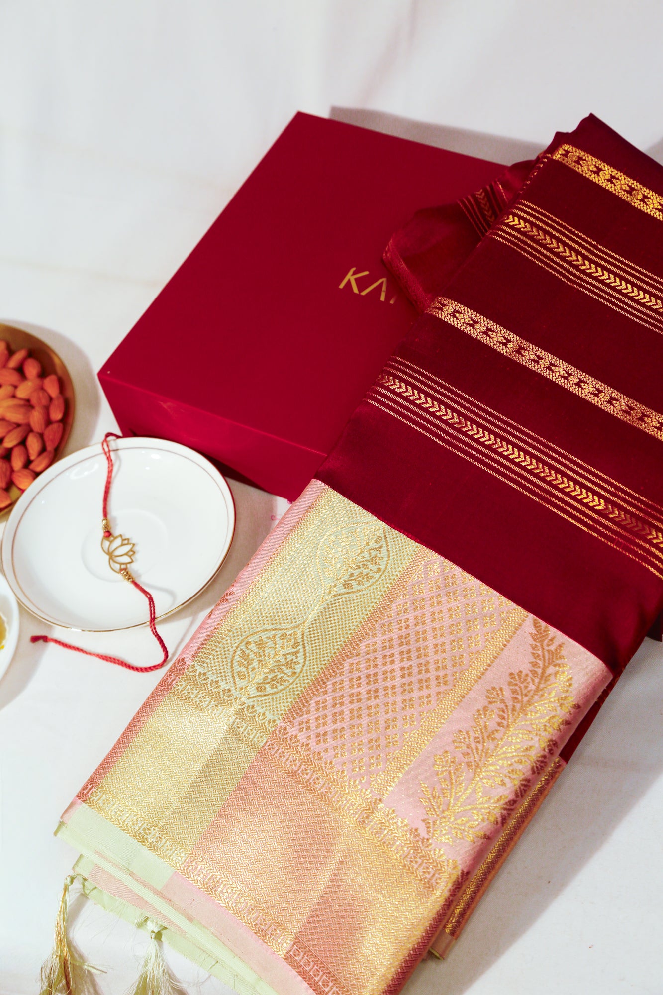 Kanchipuram Silk Lines Maroon Saree With Gift Box And Rakhi