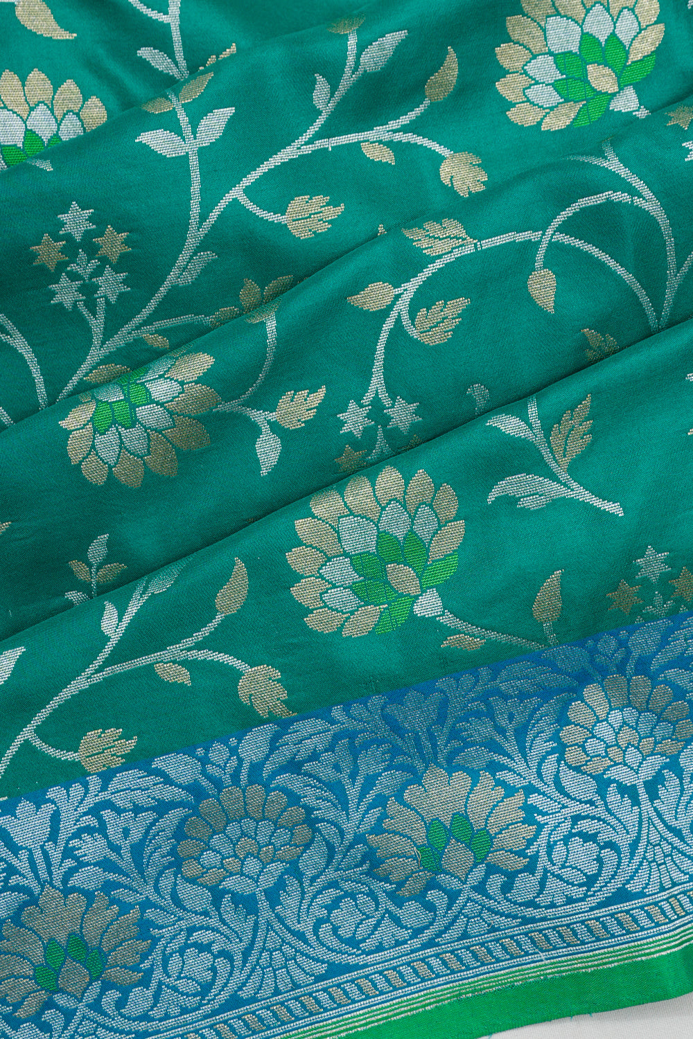 Vaanya Banaras Silk Jaal Green Saree