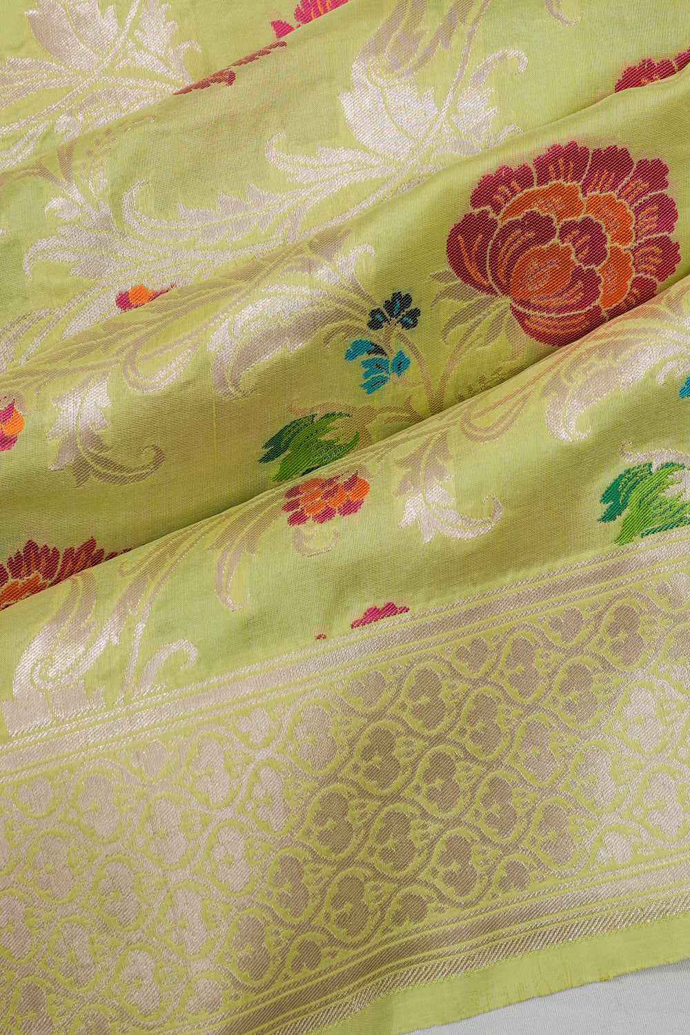 Vaanya Banaras Silk Jaal Green Saree