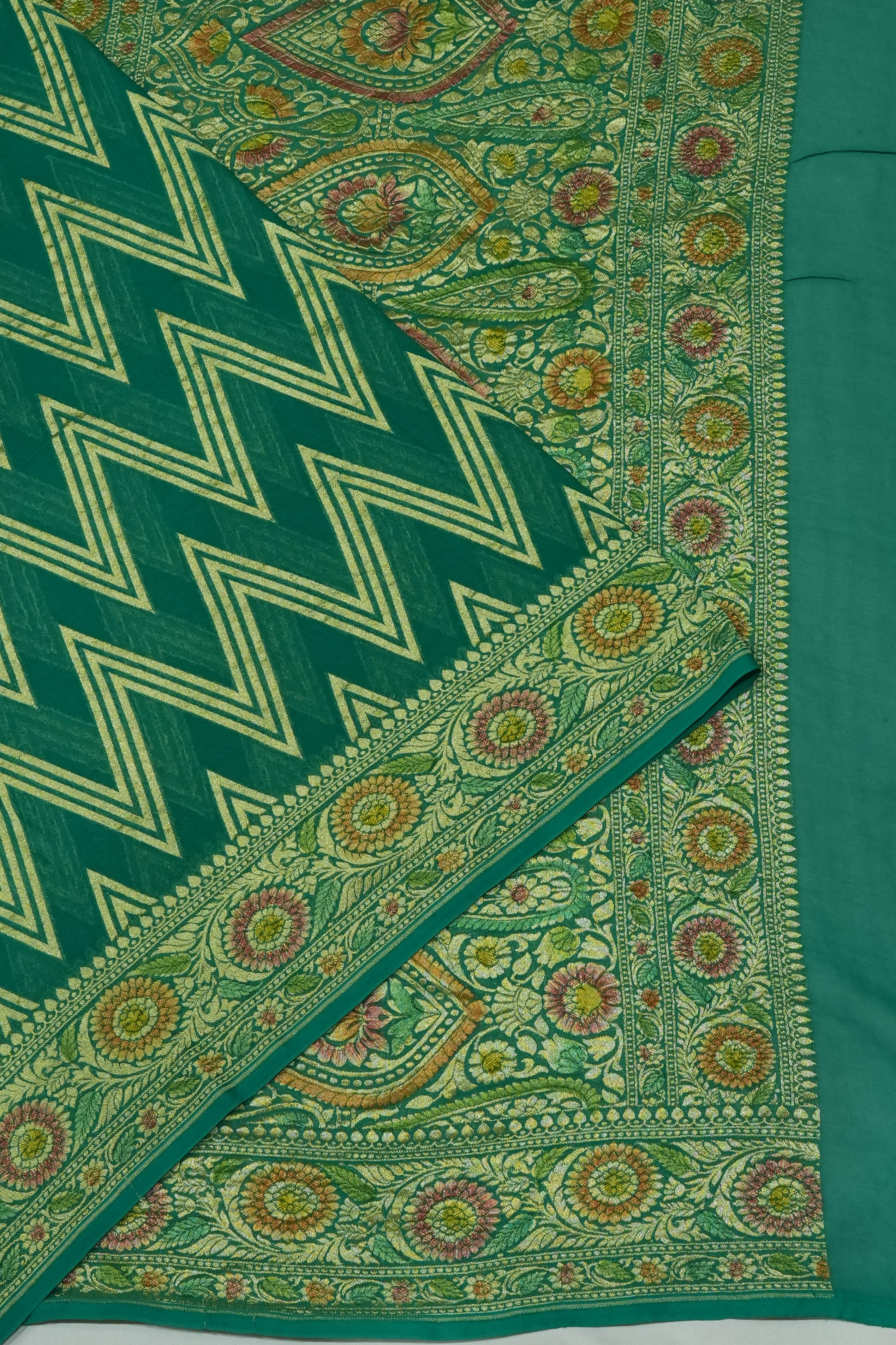 Vaanya Banaras Georgette Brocade Green Saree