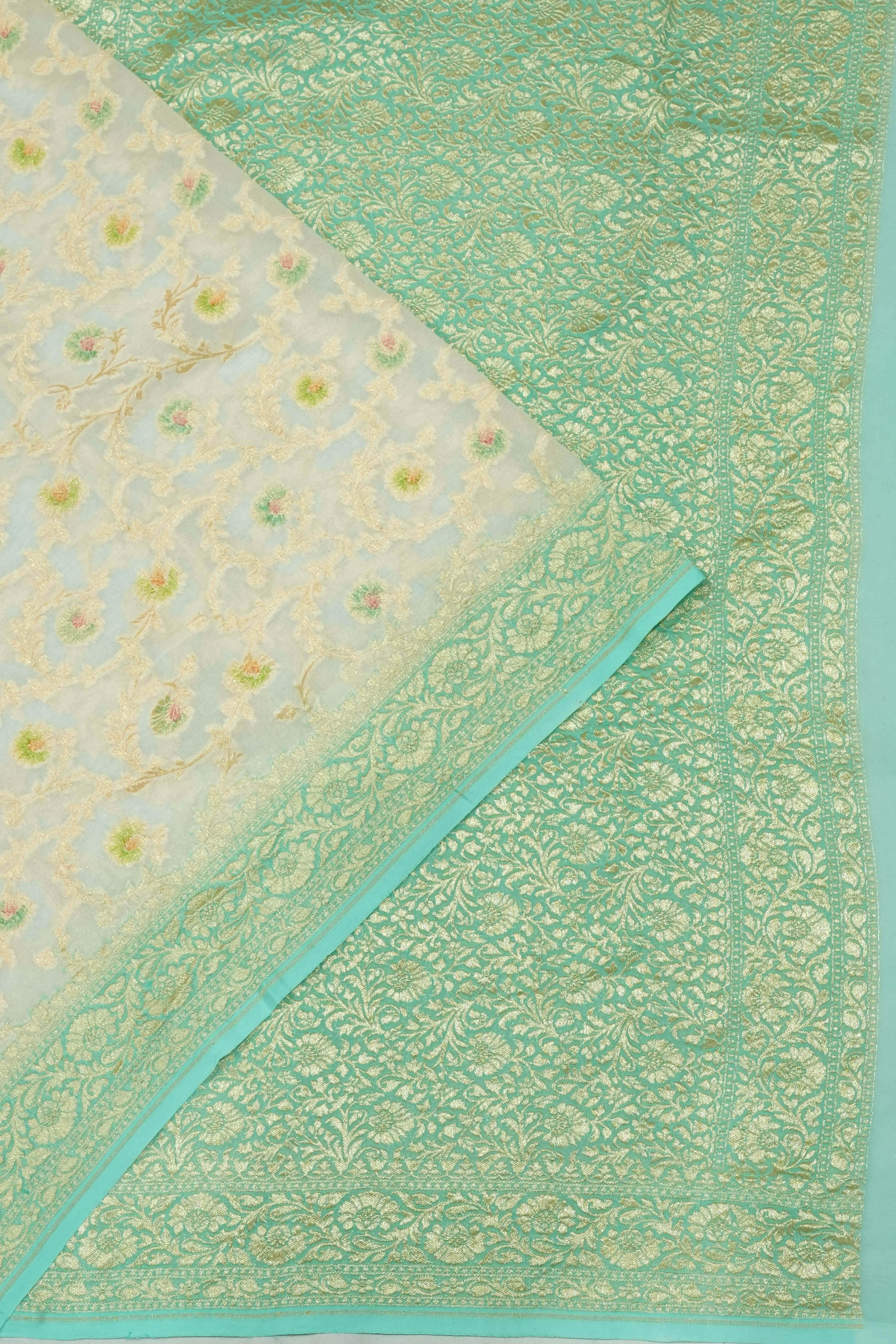 Vaanya Banaras Georgette Brocade White Saree
