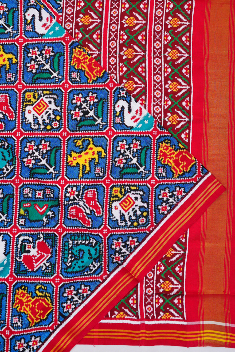 Patan Patola Silk Double Ikat 8 Figure Blue And Red Saree