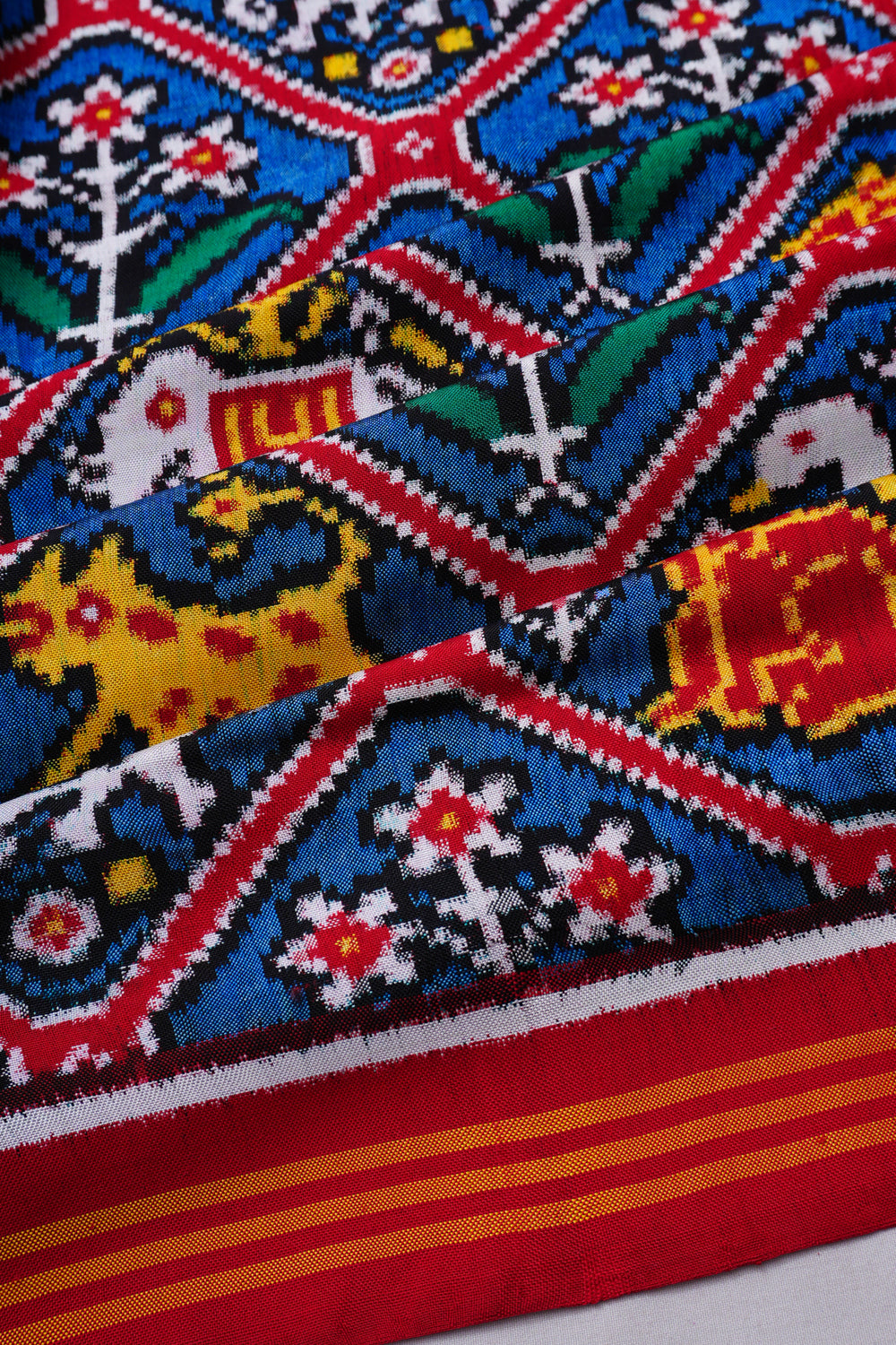 Patan Patola Silk Double Ikat 8 Figure Blue And Red Saree
