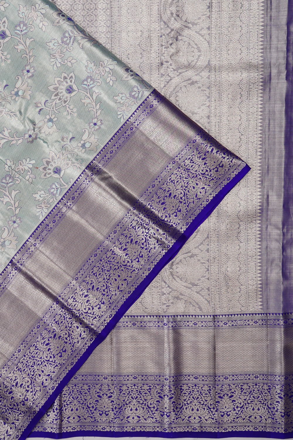 Taranga Kanchi Silk Tissue Jaal Pastel Blue Saree