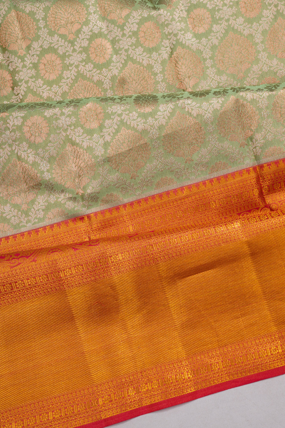 Taranga Kanchi Silk Tissue Brocade Green Saree