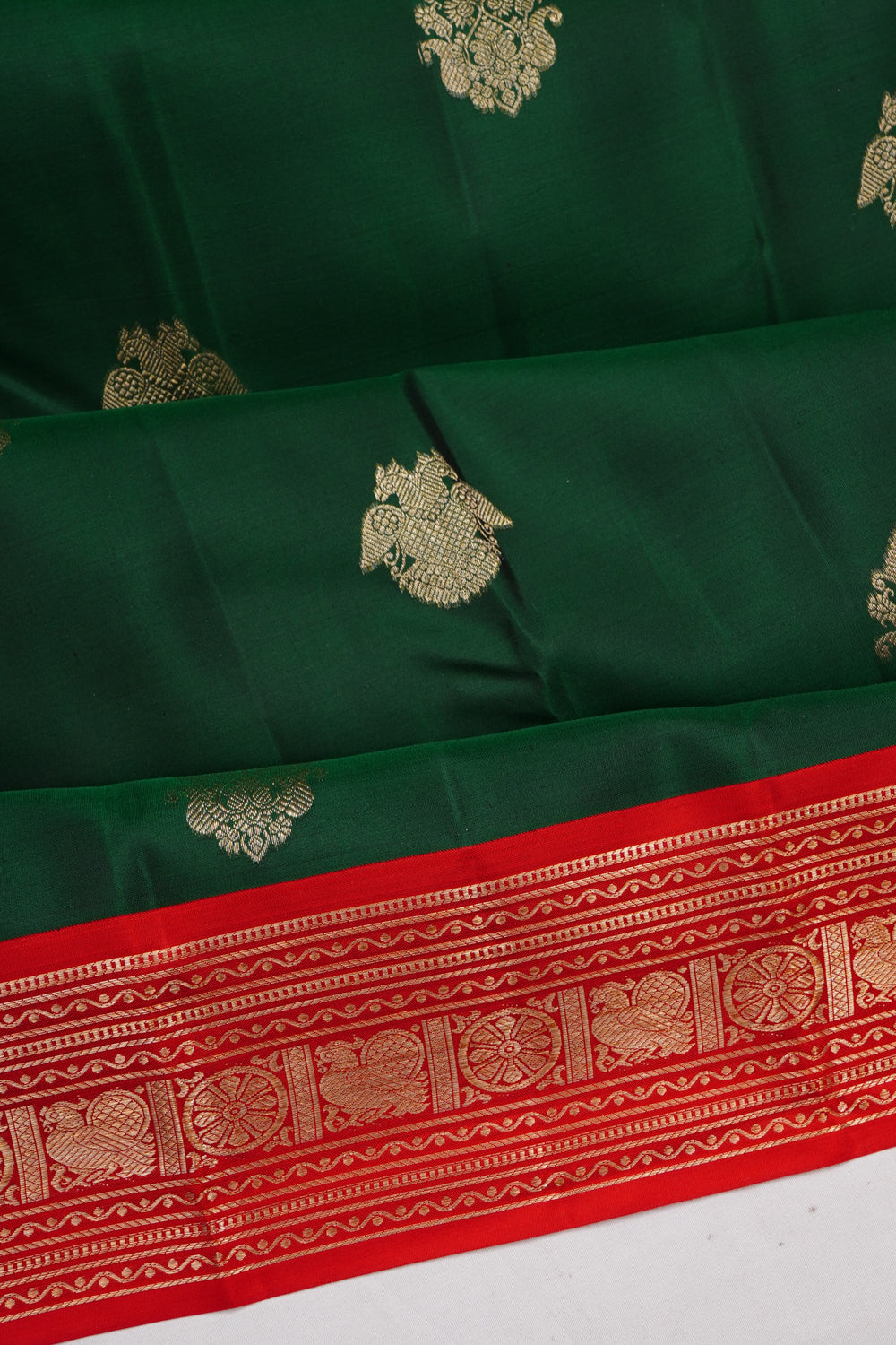 Taranga Kanchi Silk Butta Bottle Green Saree