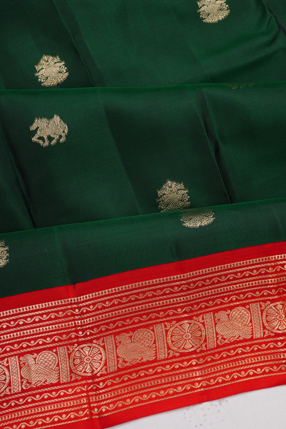 Taranga Kanchi Silk Butta Bottle Green Saree