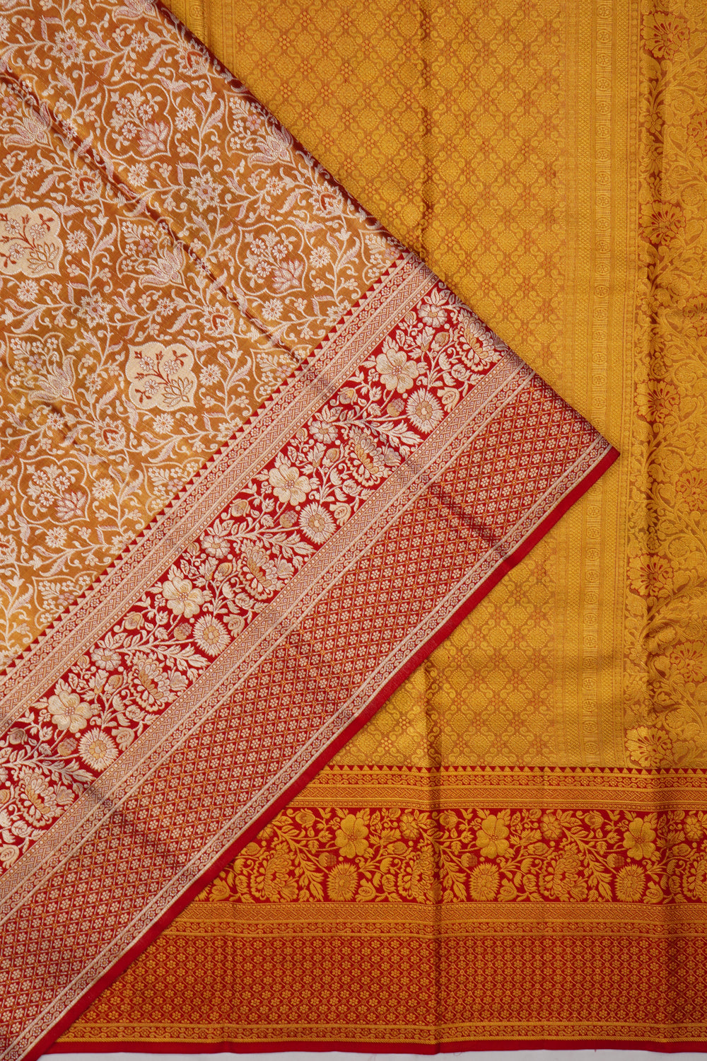 Taranga Kanchi Silk Tissue Jaal Rust Orange Saree