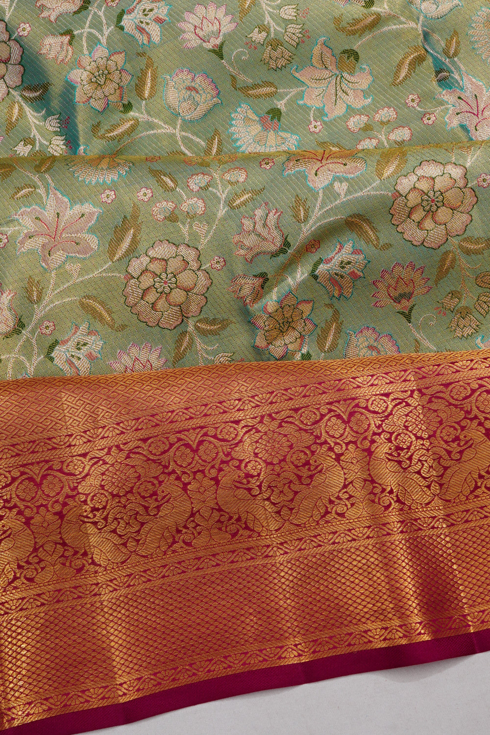 Taranga Kanchi Silk Tissue Jaal Green Saree