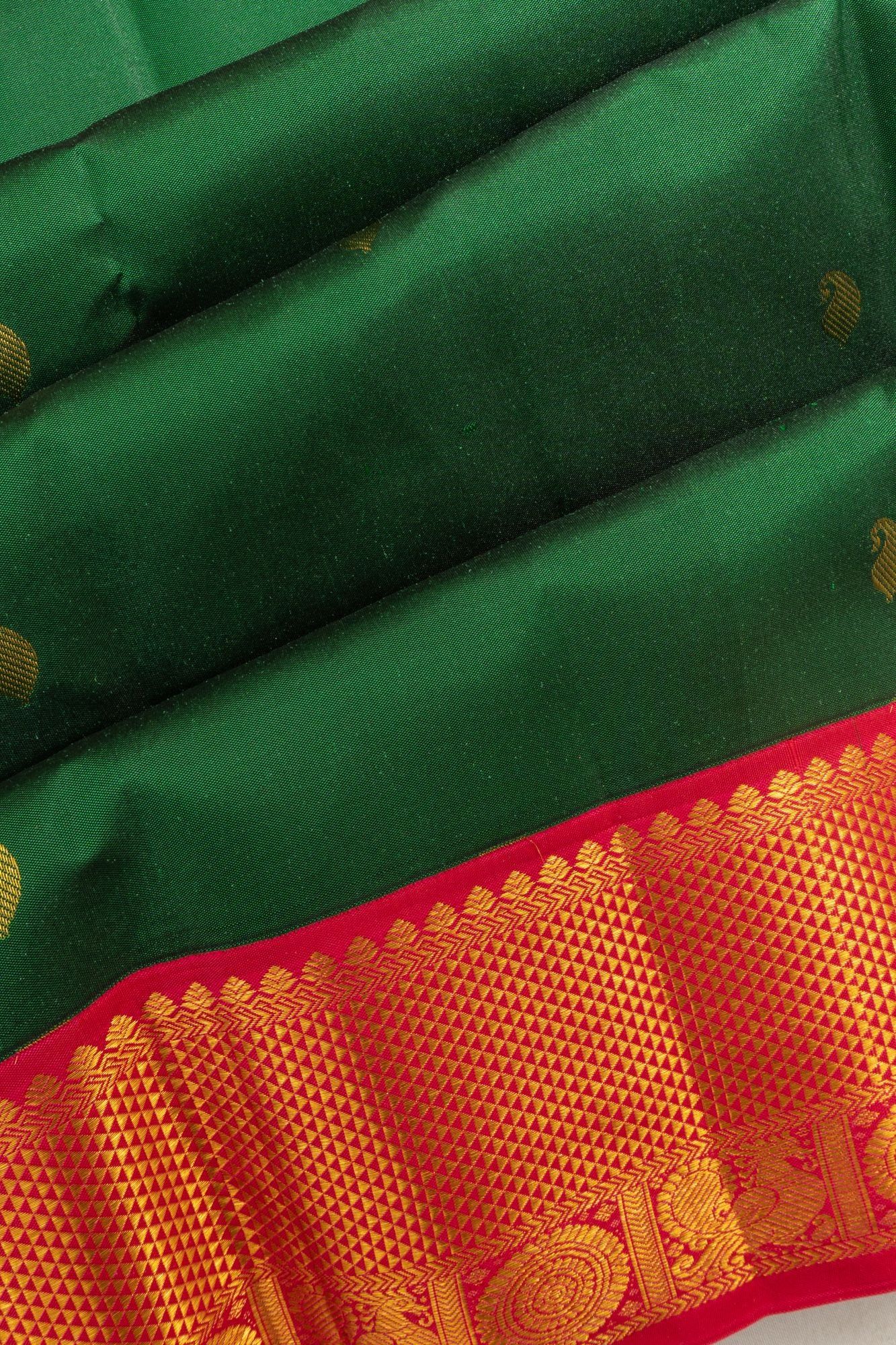 Taranga Kanchi Silk Butta Bottle Green Saree