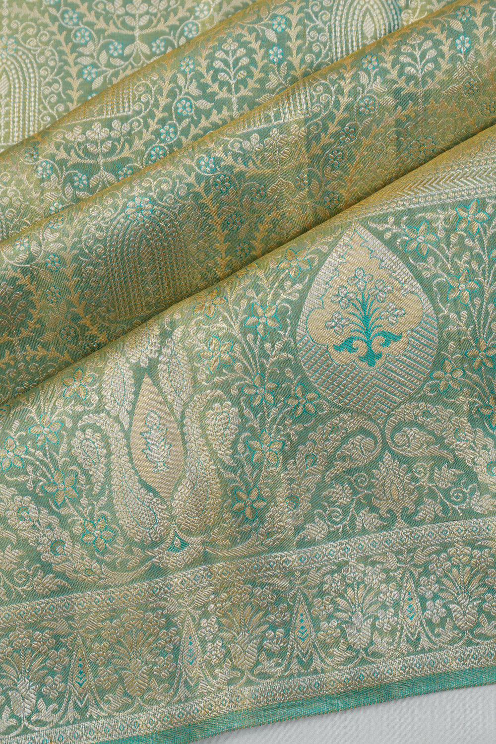 Taranga Kanchi Silk Tissue Brocade Pastel Green Saree
