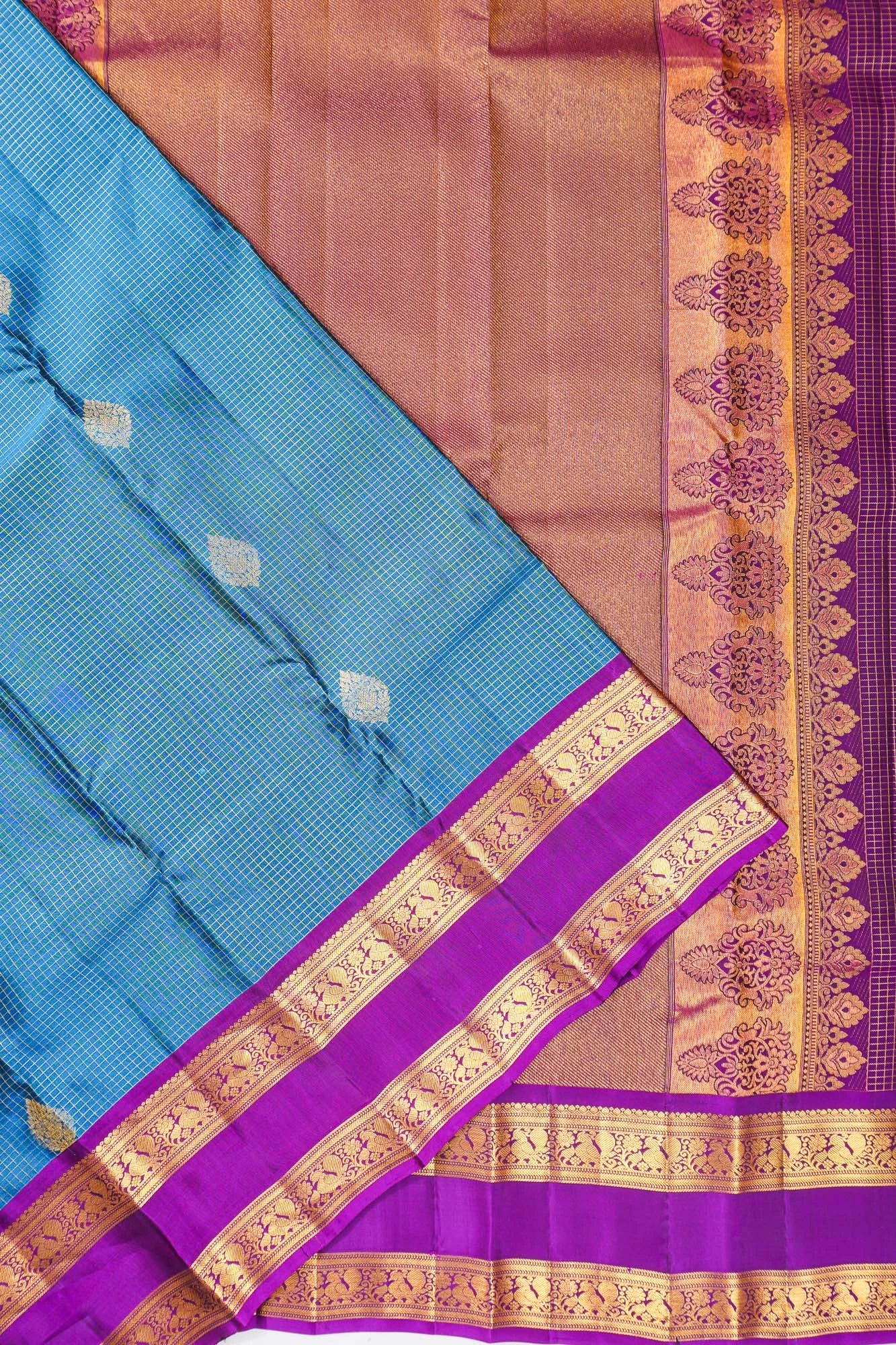 Taranga Kanchi Silk Checks And Butta Blue Saree With Rettai Pettu Border