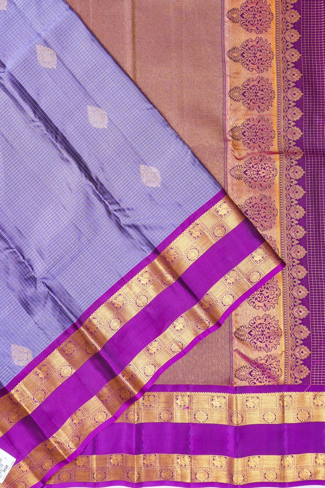 Taranga Kanchi Silk Checks And Butta Lavender Saree With Rettai Pettu Border