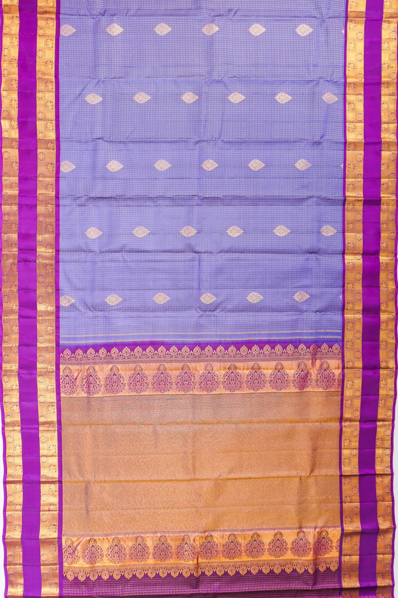 Taranga Kanchi Silk Checks And Butta Lavender Saree With Rettai Pettu Border
