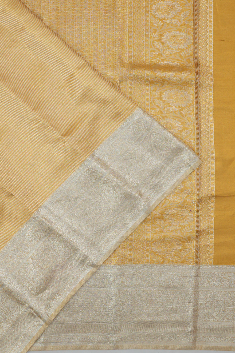 Taranga Kanchi Silk Tissue Lines Gold Saree